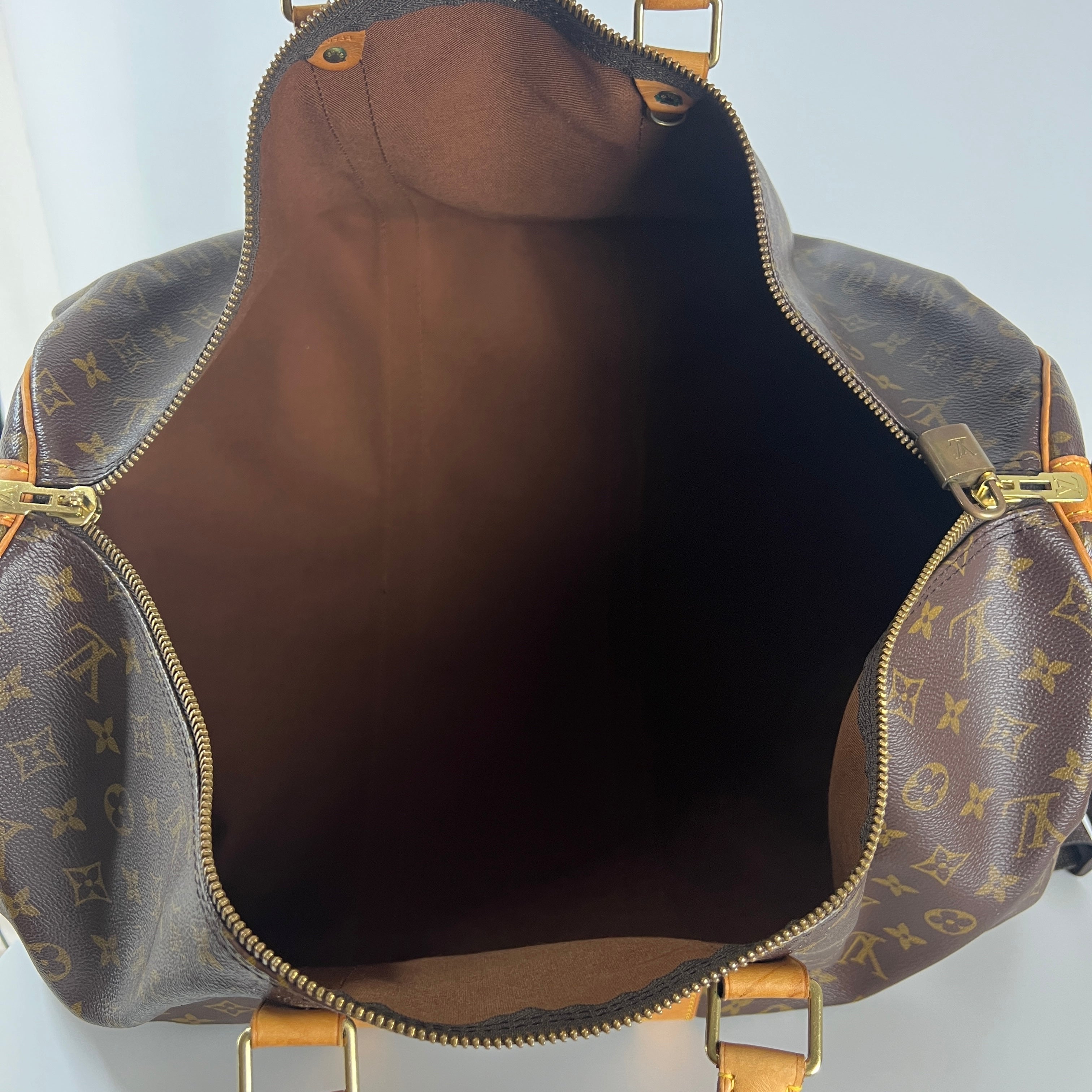 LOUIS VUITTON Keepall 55 canvas and brown leather handbag