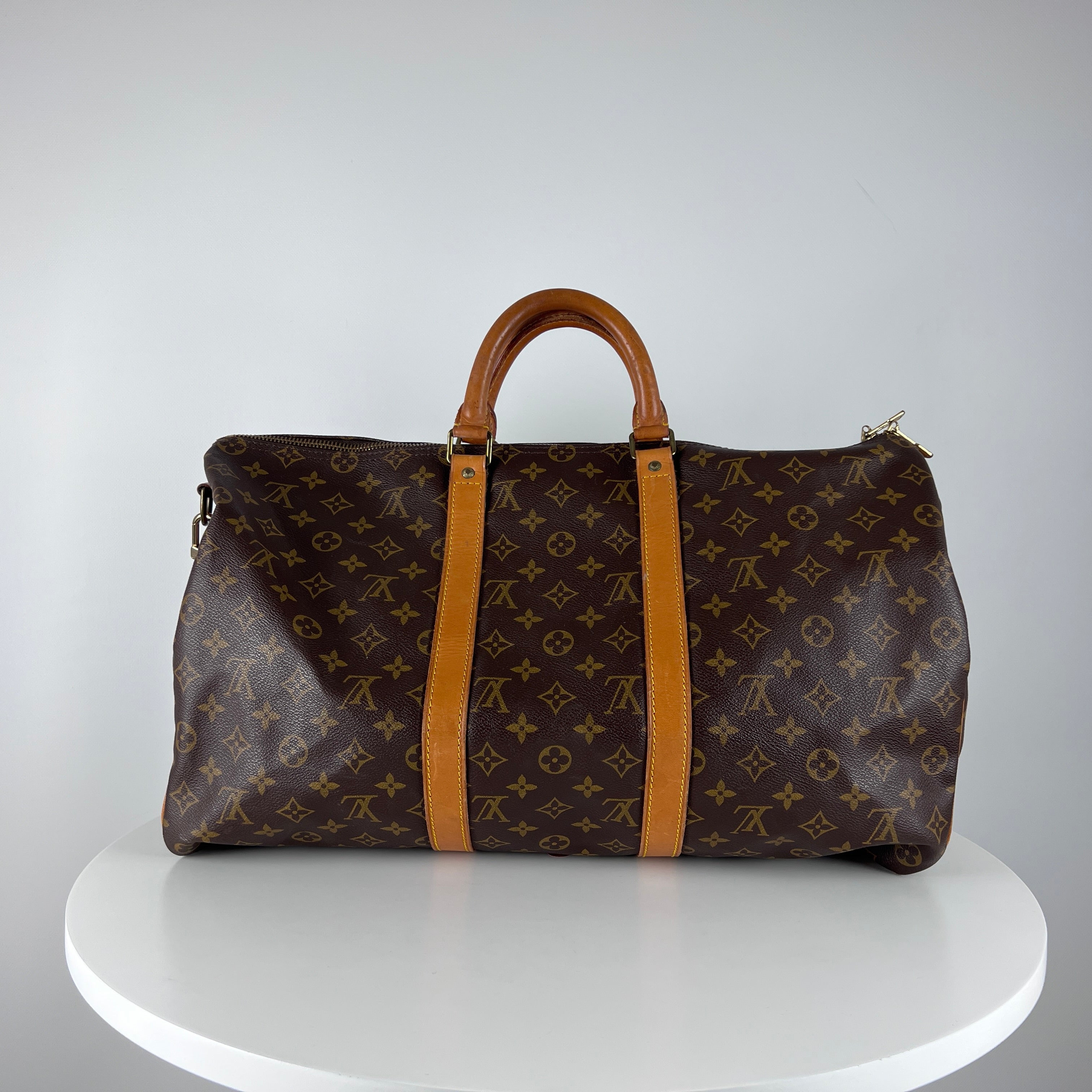 LOUIS VUITTON Keepall 50 canvas and brown leather handbag