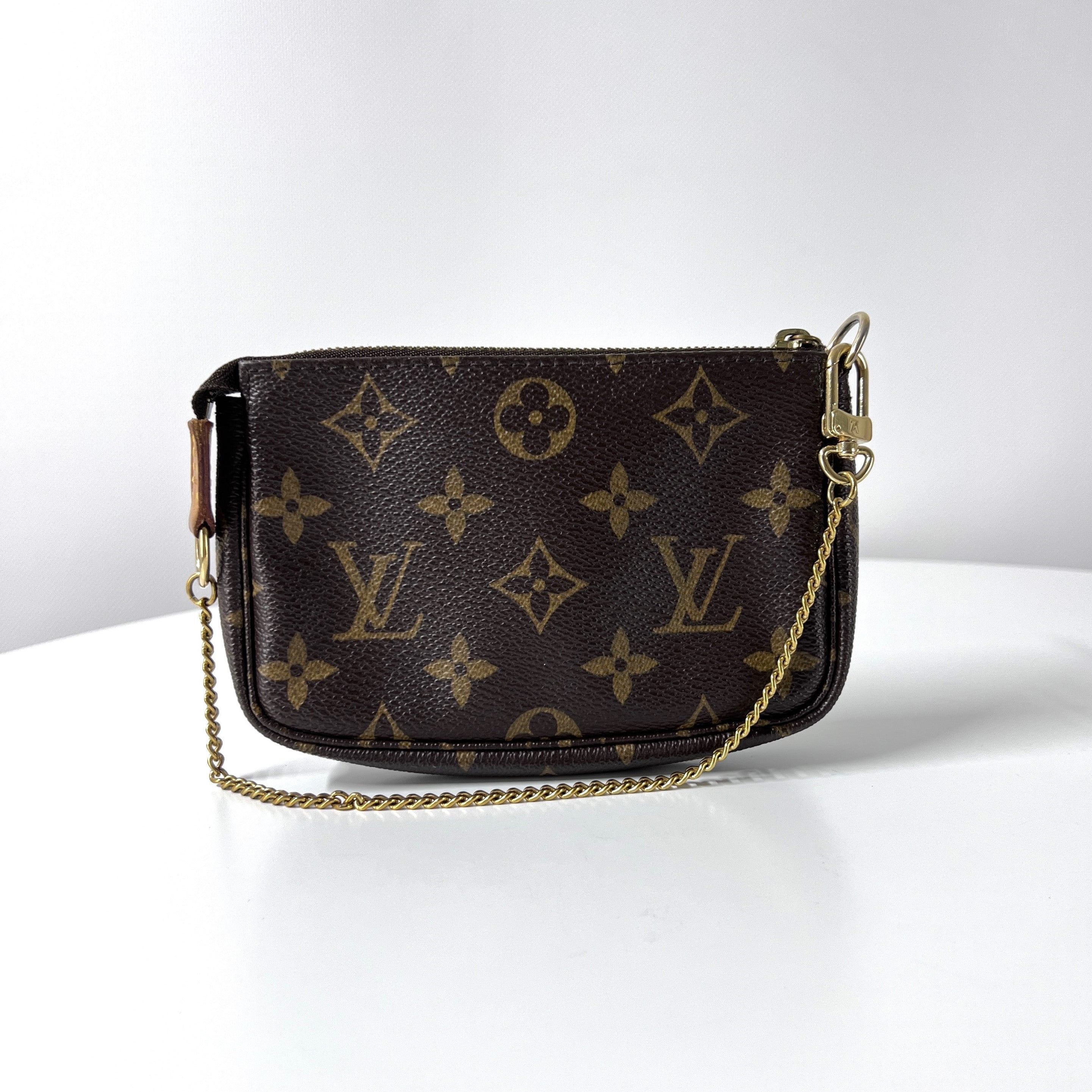 Sac à main LOUIS VUITTON Accessory Pouch toile et cuir marron