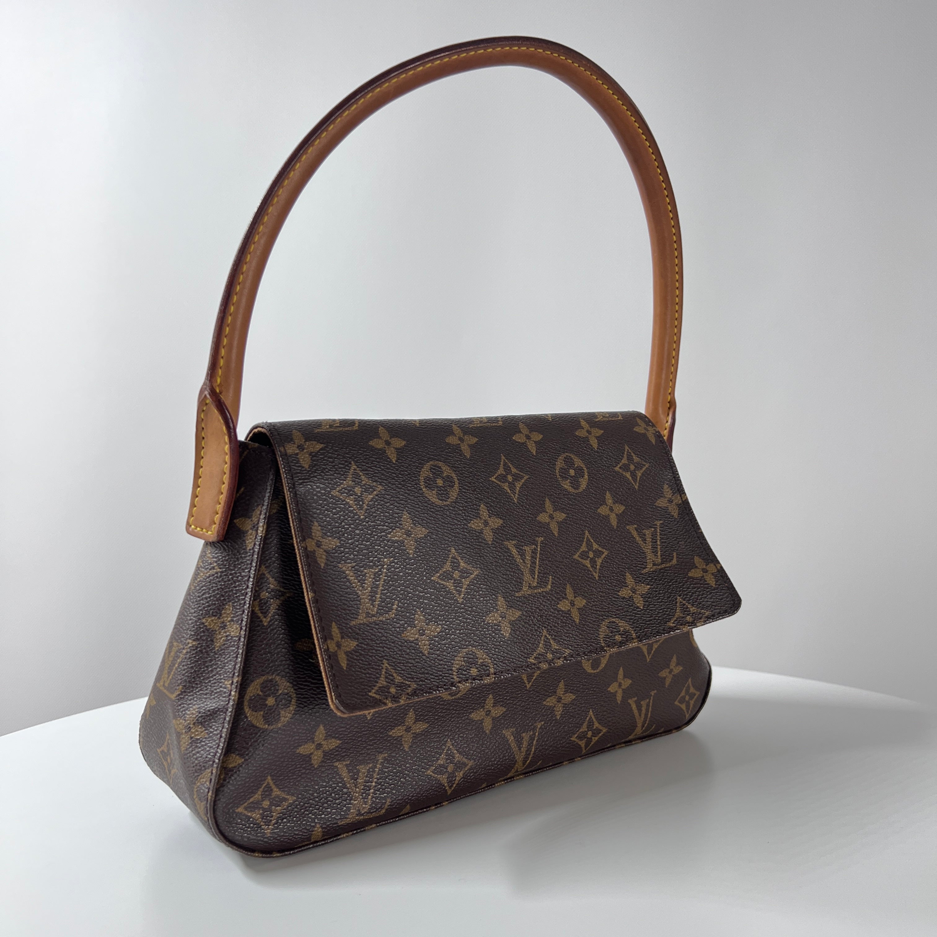 LOUIS VUITTON Looping handbag in brown canvas and leather