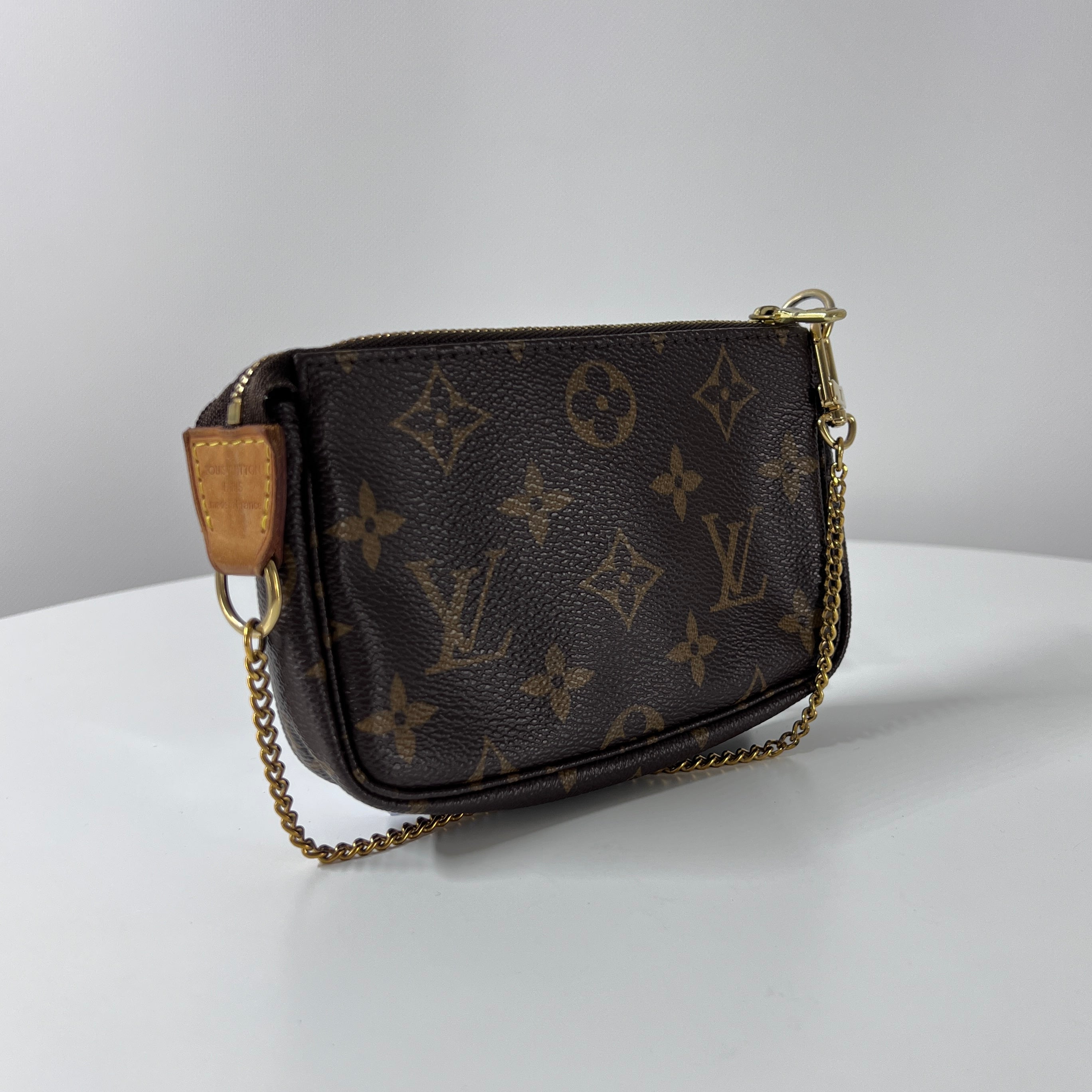 Sac à main LOUIS VUITTON Accessory Pouch toile et cuir marron
