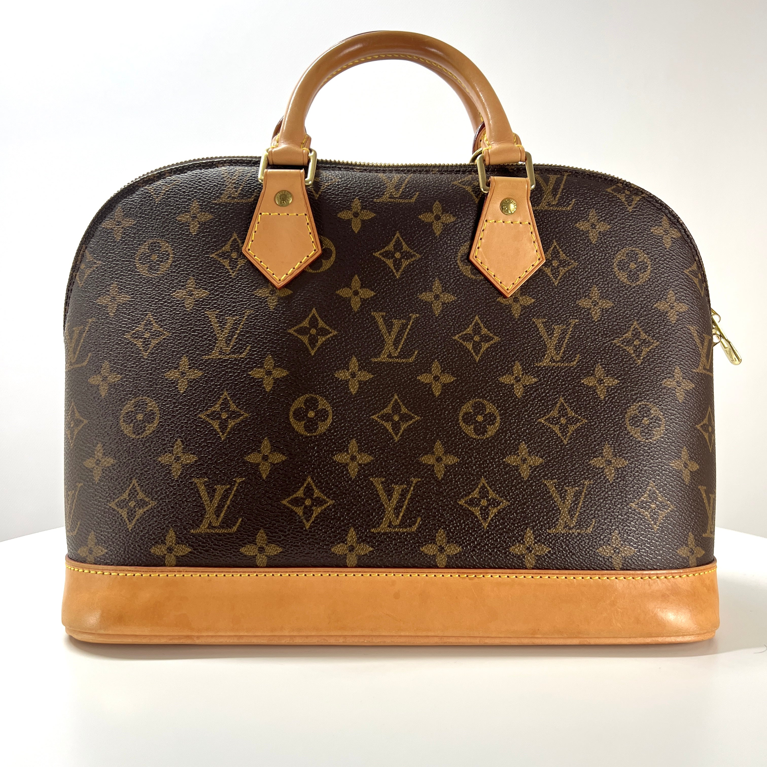 Sac à main LOUIS VUITTON Alma toile et cuir marron