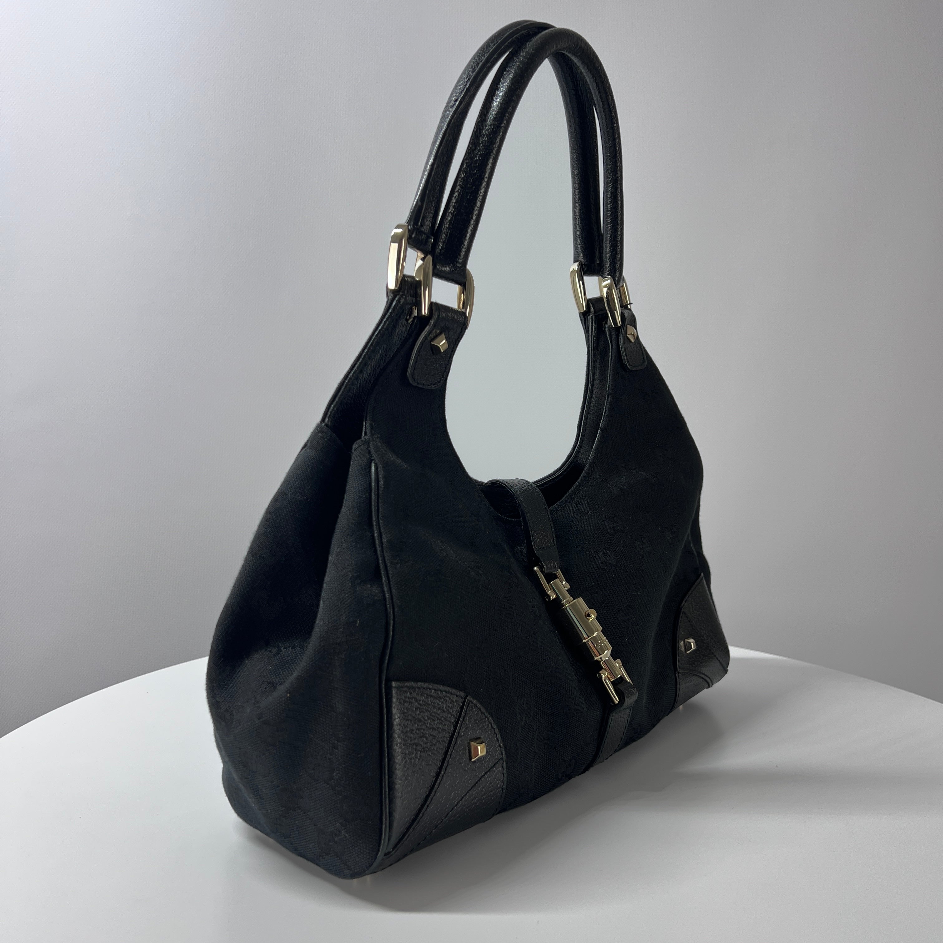 GUCCI Jackie canvas and black leather handbag