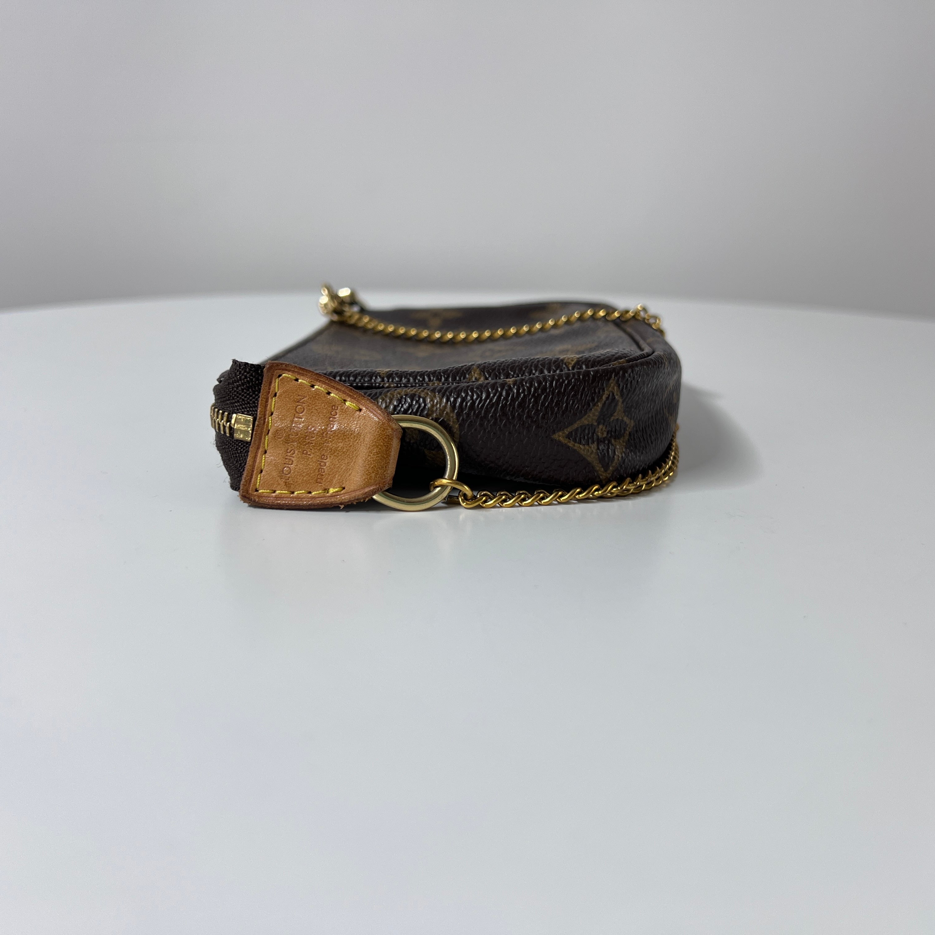 Sac à main LOUIS VUITTON Accessory Pouch toile et cuir marron