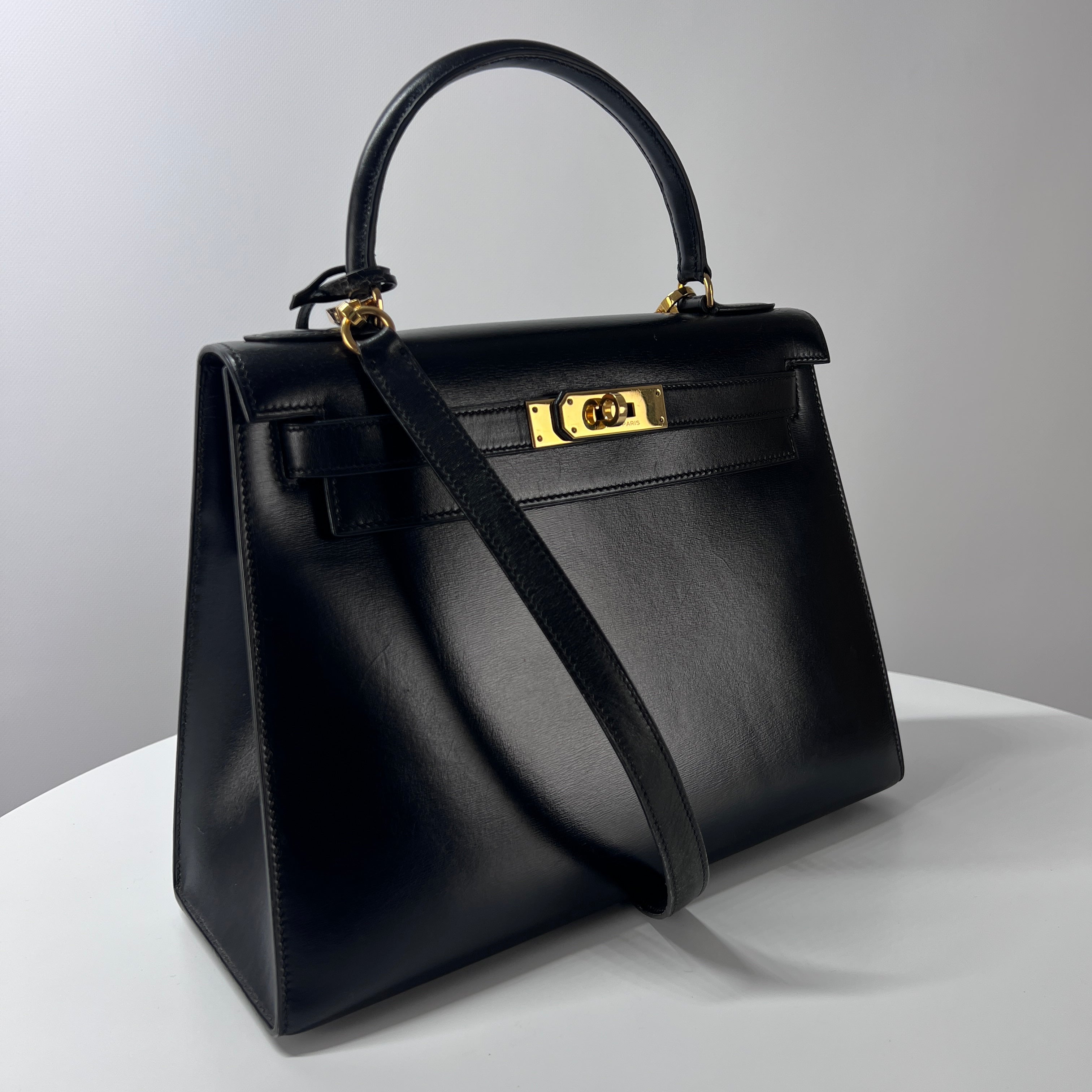 Sac à main HERMES Kelly cuir noir