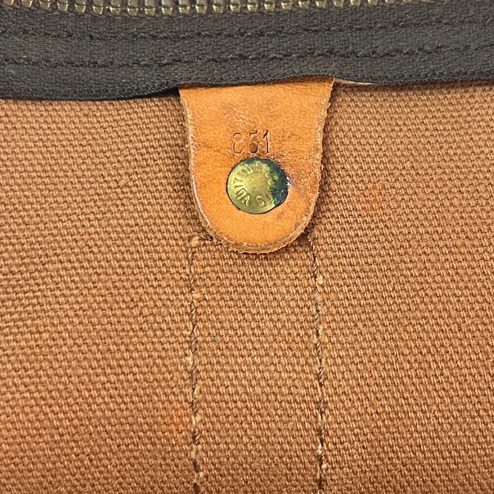 LOUIS VUITTON Keepall 50 canvas and brown leather handbag