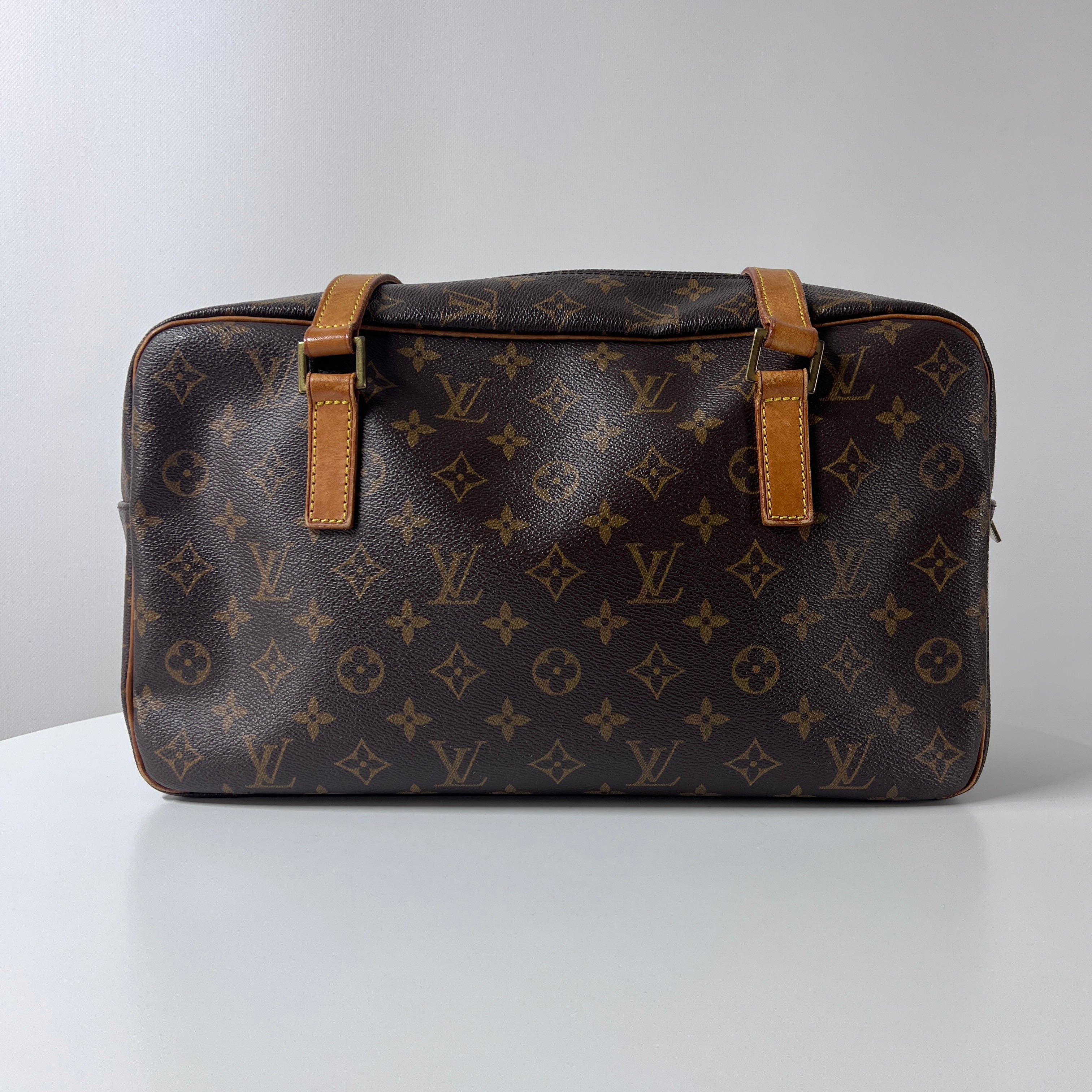 Sac à main LOUIS VUITTON Cité MM toile et cuir marron