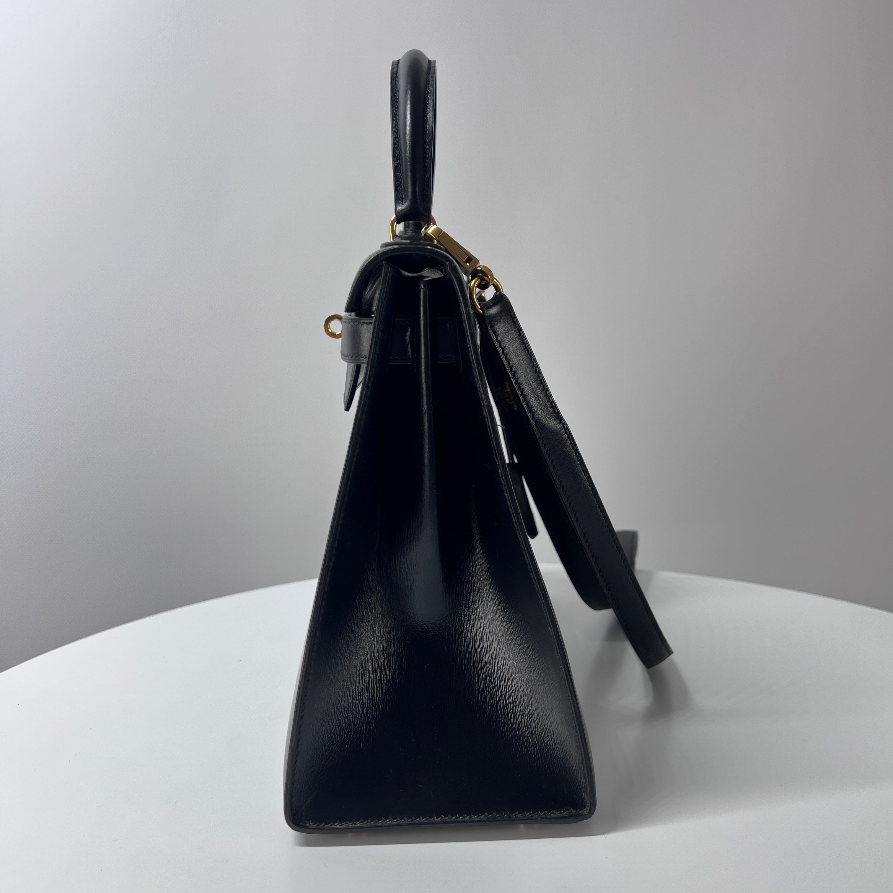 Sac à main HERMES Kelly cuir noir