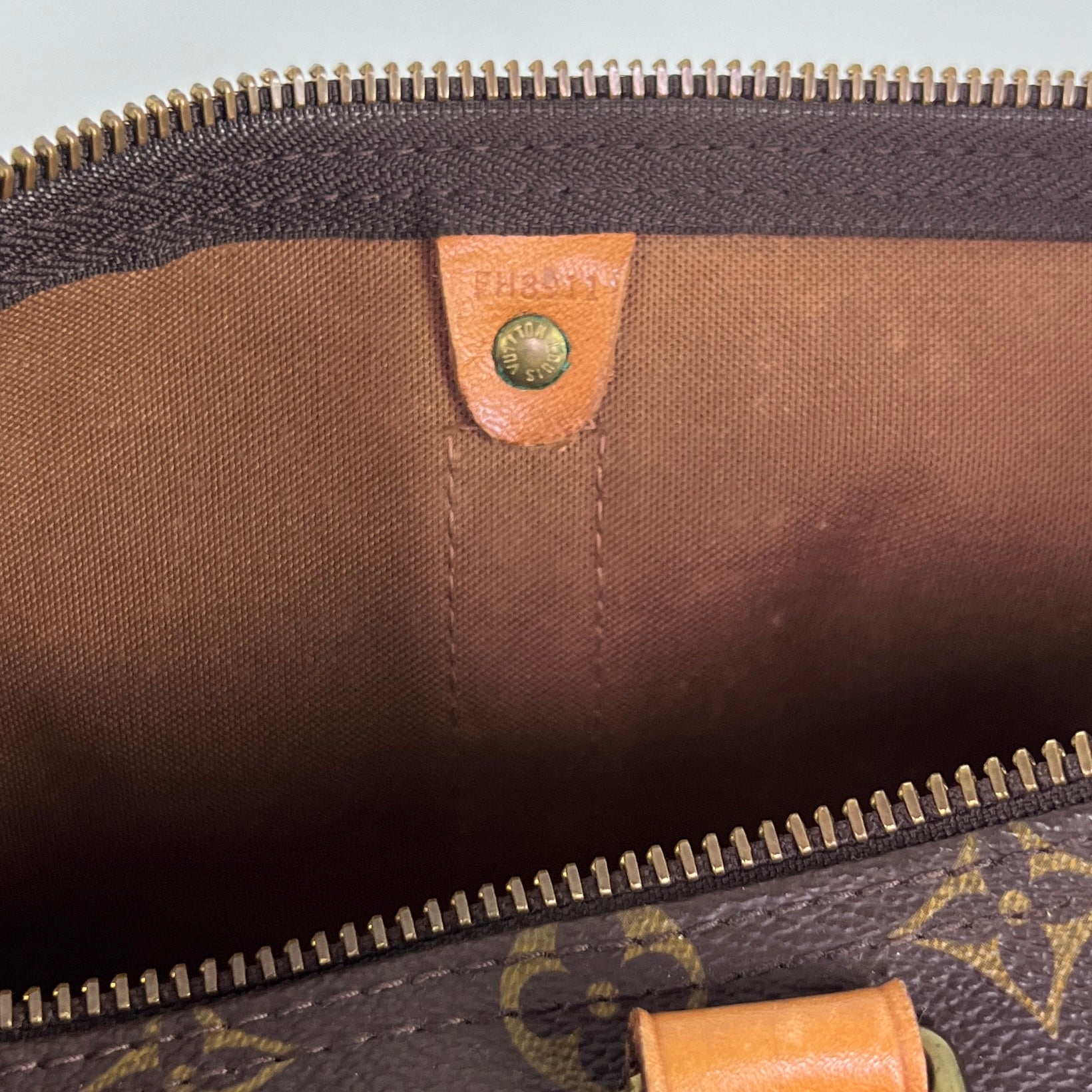 LOUIS VUITTON Keepall 50 canvas and brown leather handbag