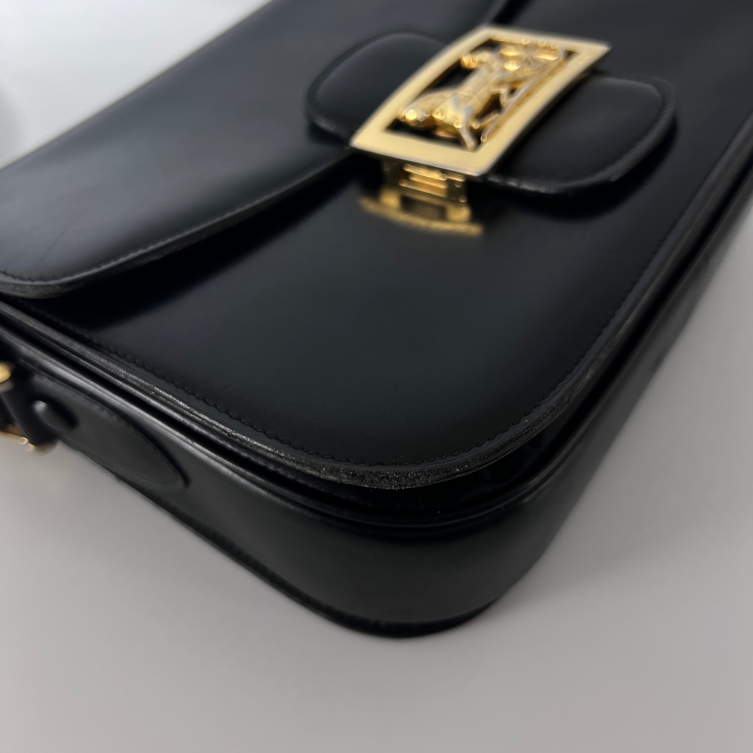CELINE Triomphe black leather handbag