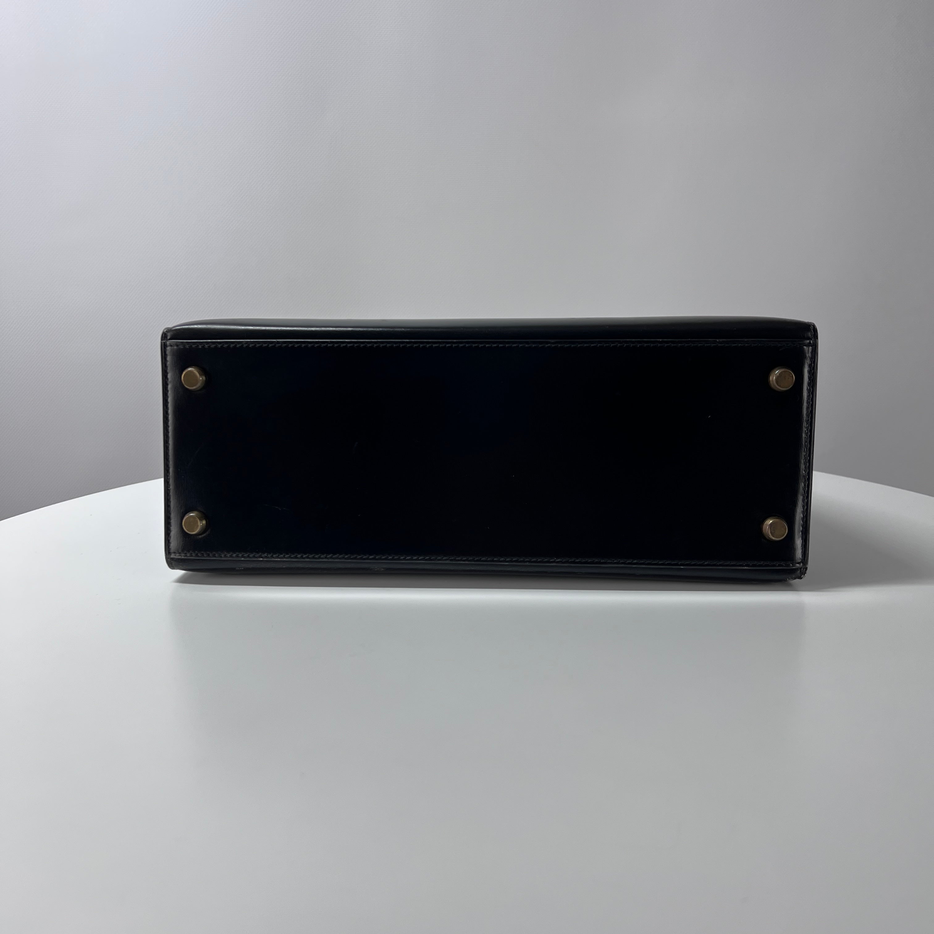 Sac à main HERMES Kelly cuir noir