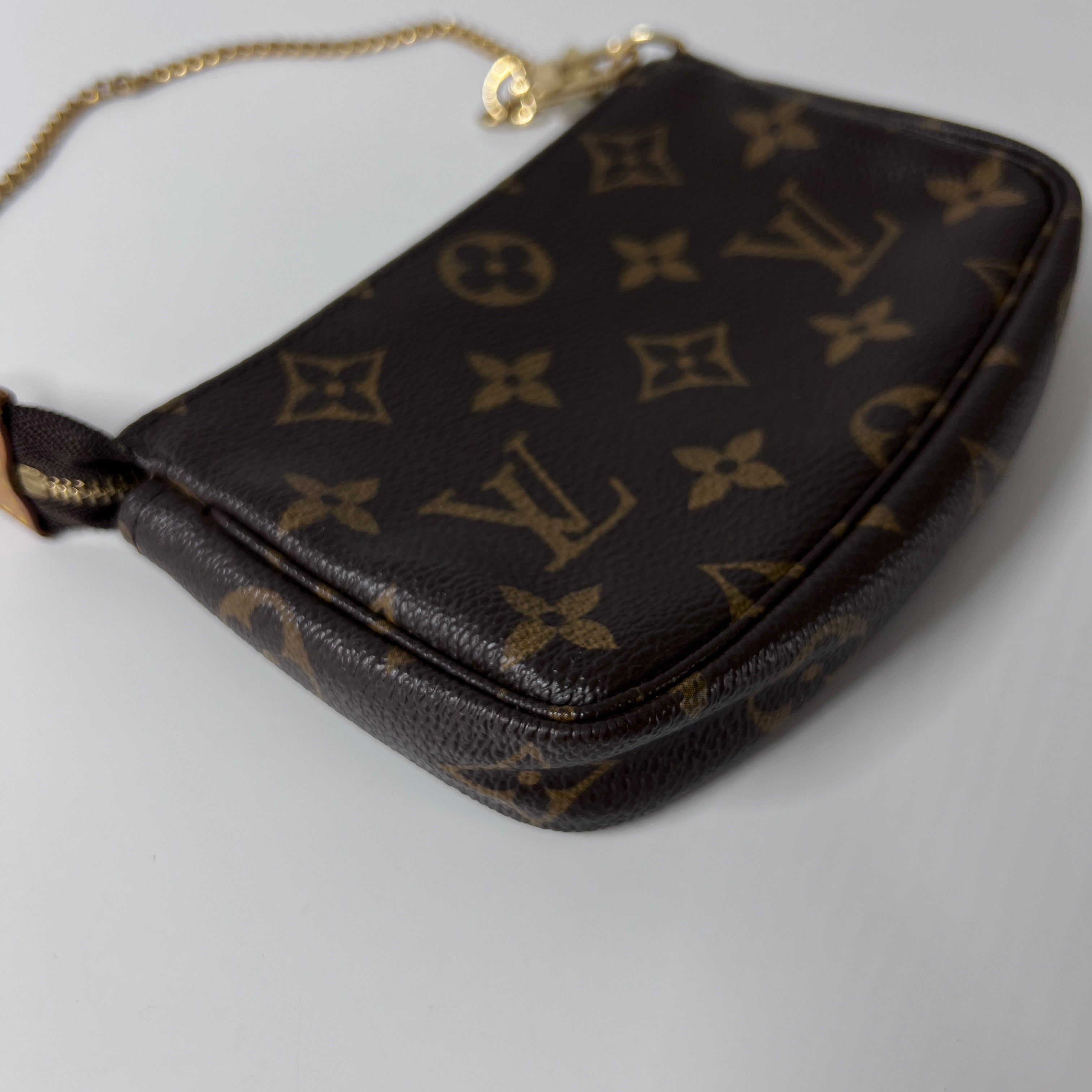 Sac à main LOUIS VUITTON Accessory Pouch toile et cuir marron