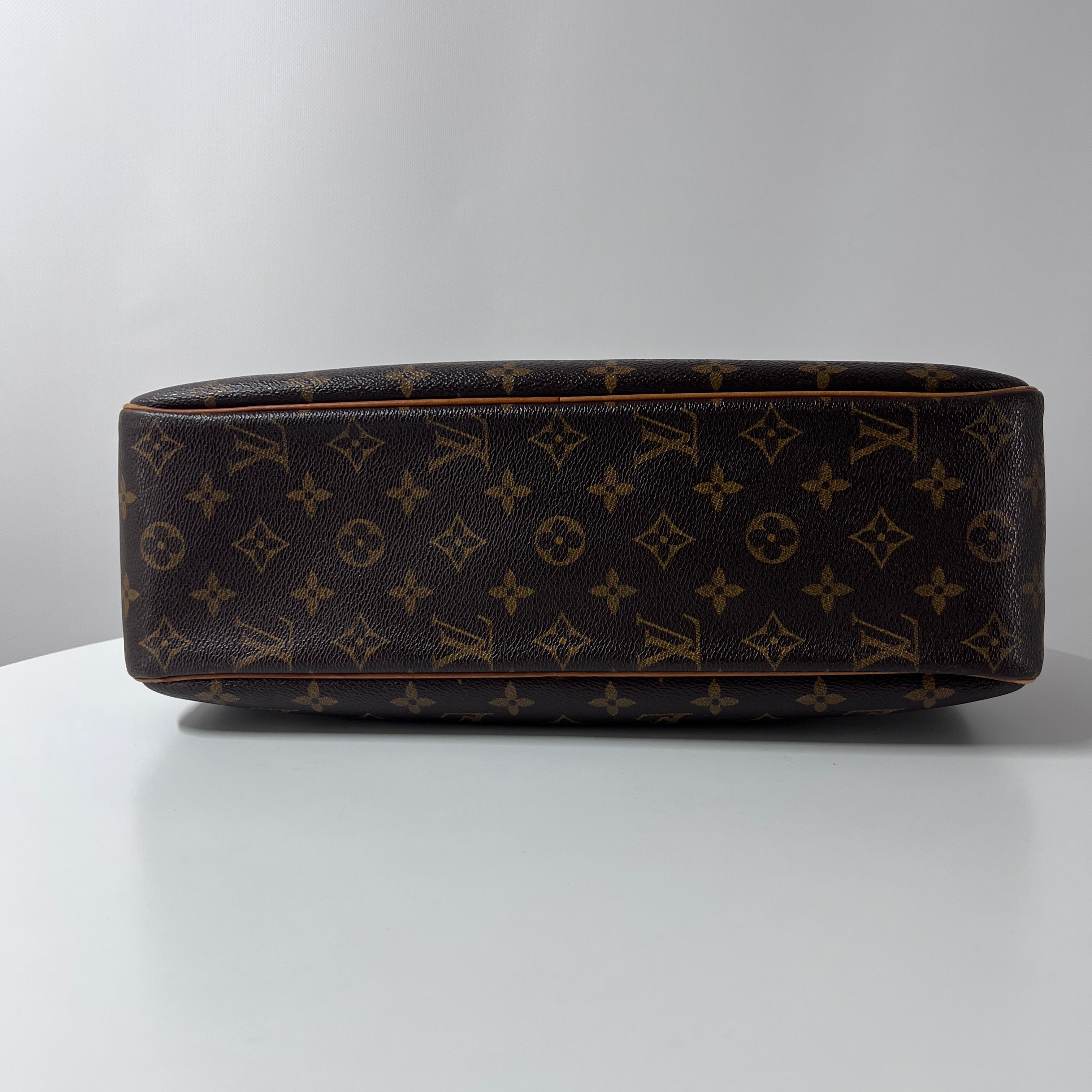Sac à main LOUIS VUITTON Cité MM toile et cuir marron
