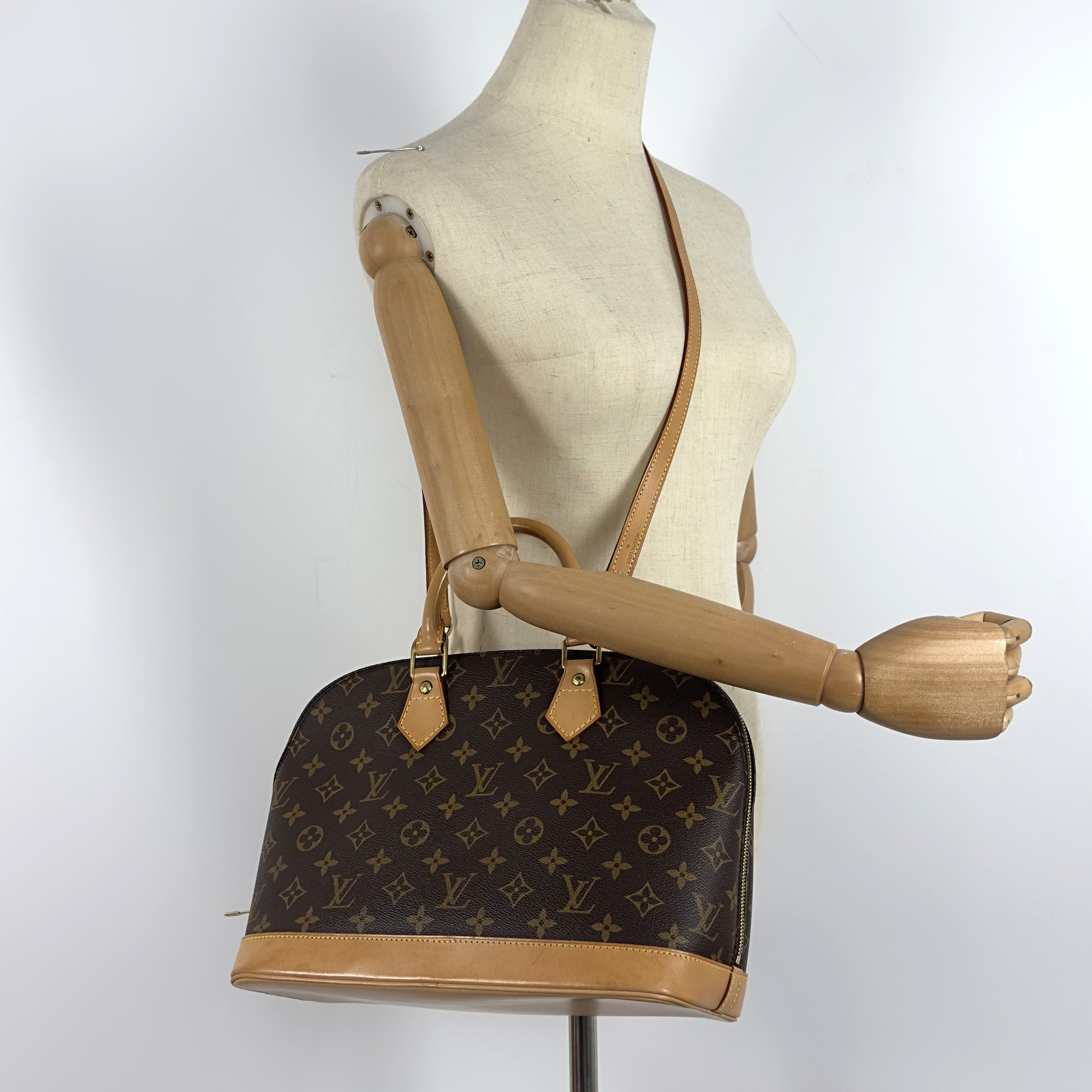 Sac à main LOUIS VUITTON Alma MM toile et cuir marron