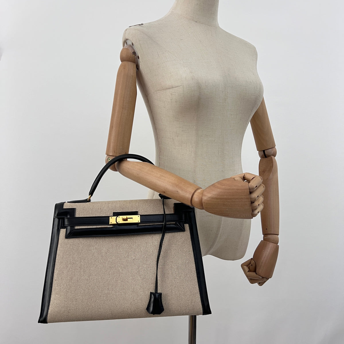 Sac HERMÈS Kelly 32 toile et cuir beige