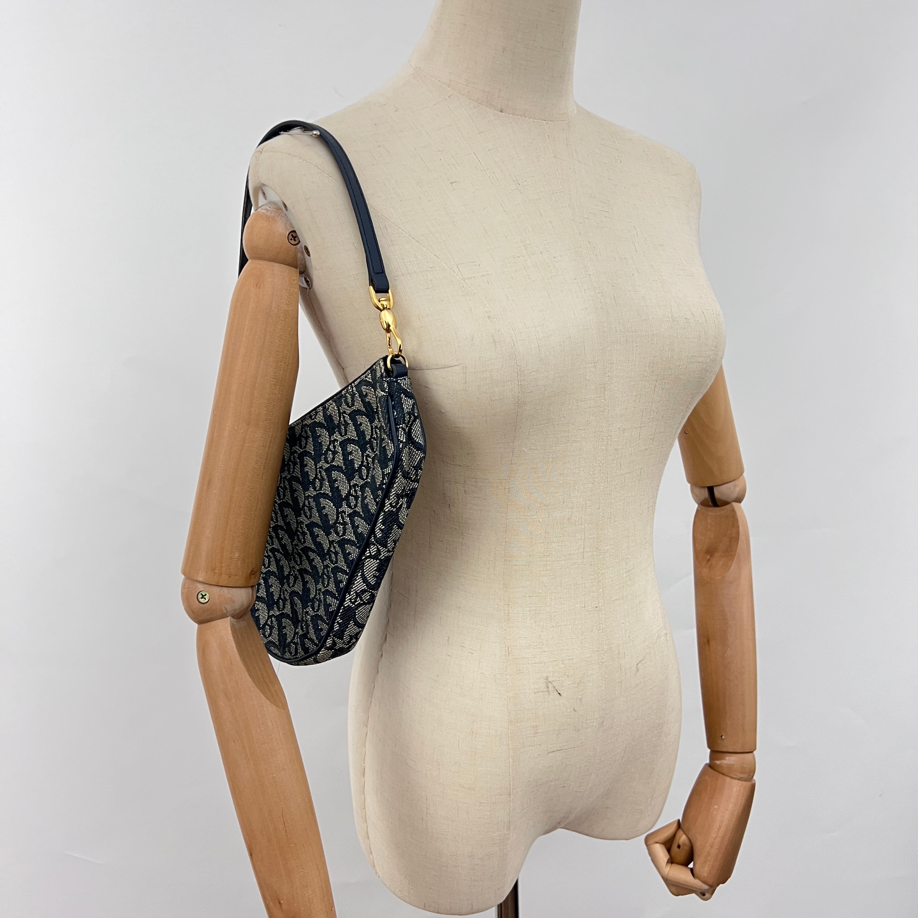Sac DIOR Saddle Pouch toile et cuir bleu marine