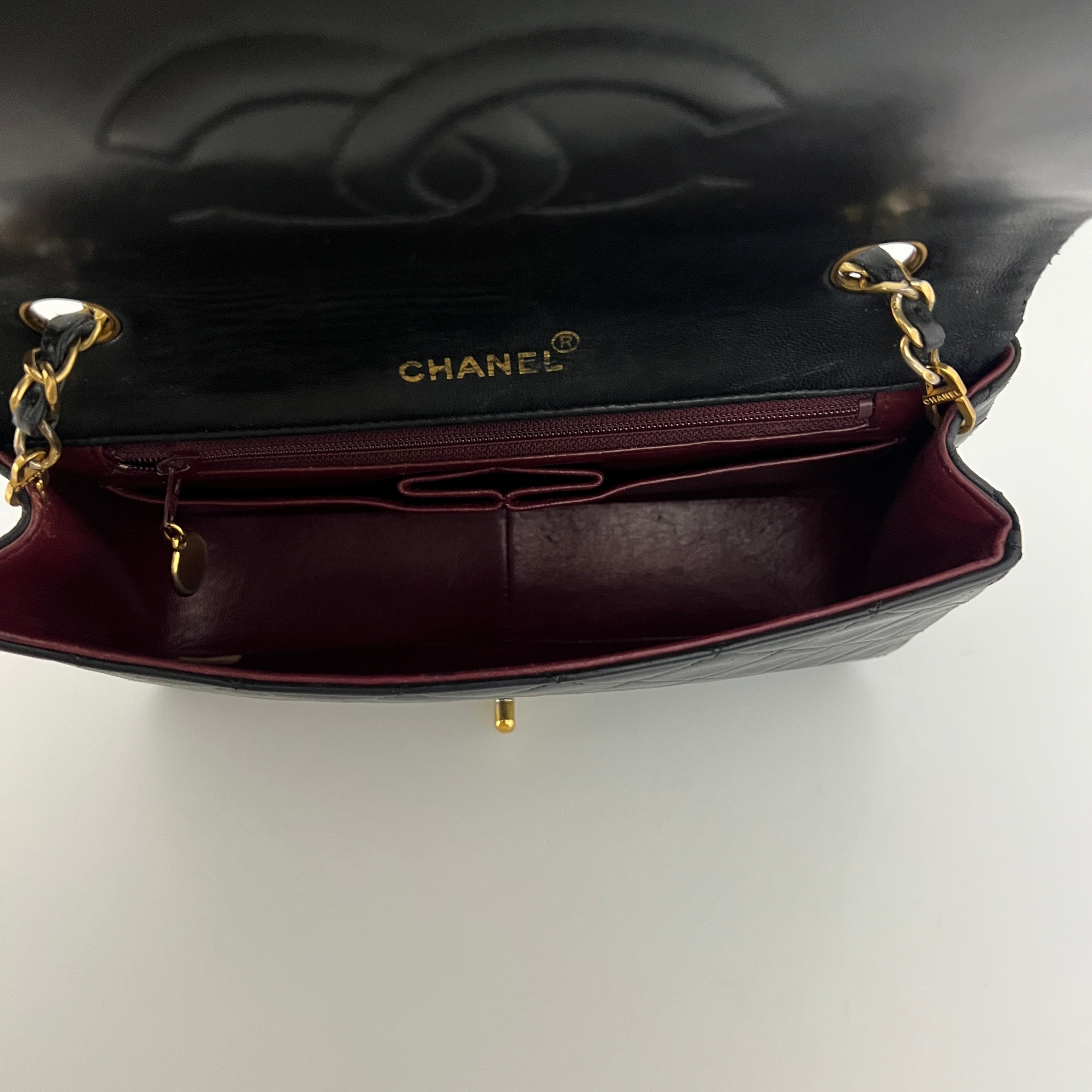 CHANEL Classic Small Shoulder Bag in black lambskin