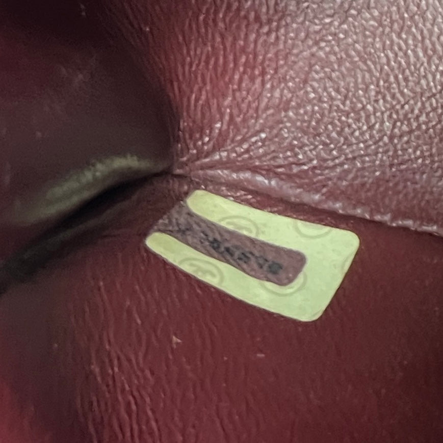 CHANEL Classic Small Shoulder Bag in black lambskin