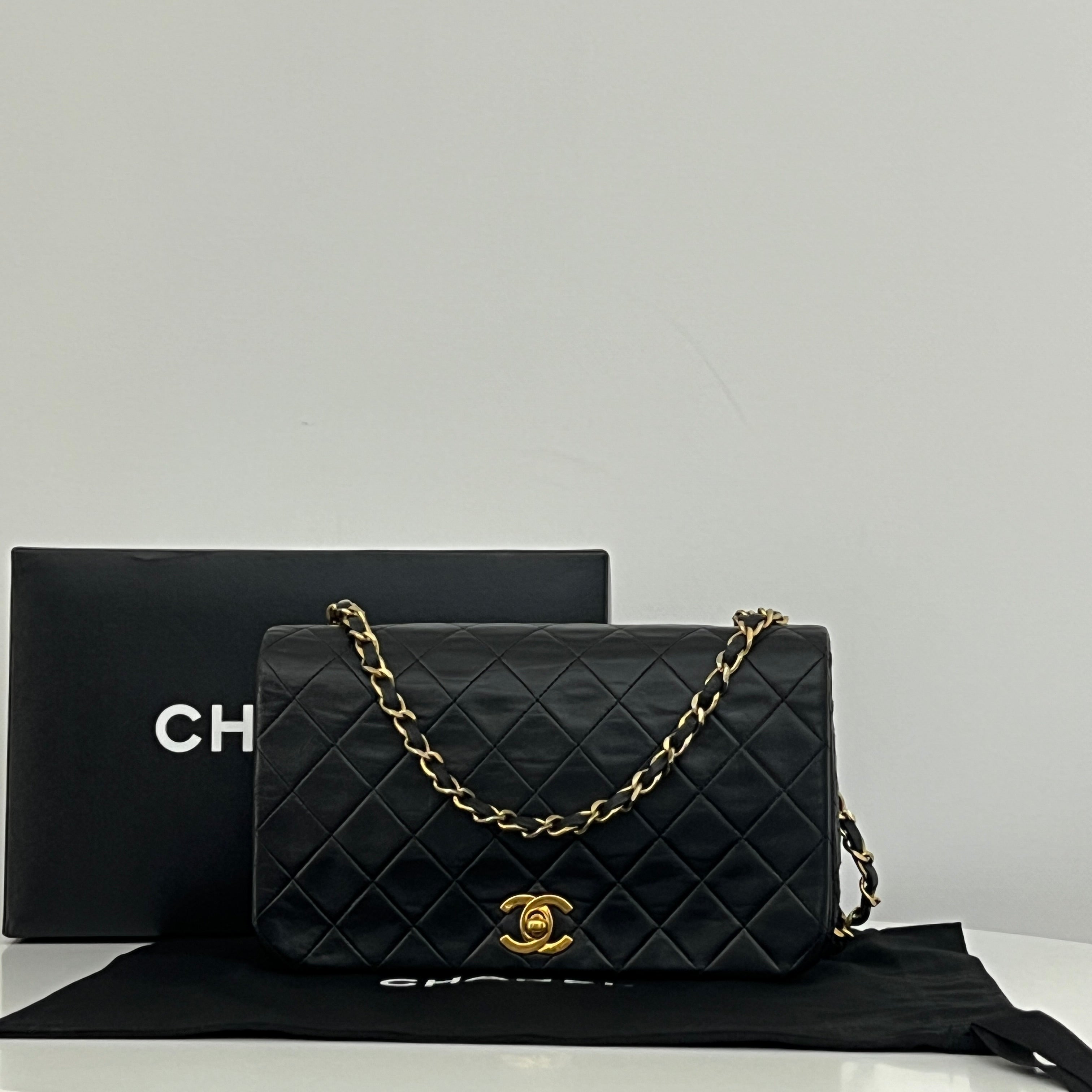 CHANEL Classic Small Shoulder Bag in black lambskin