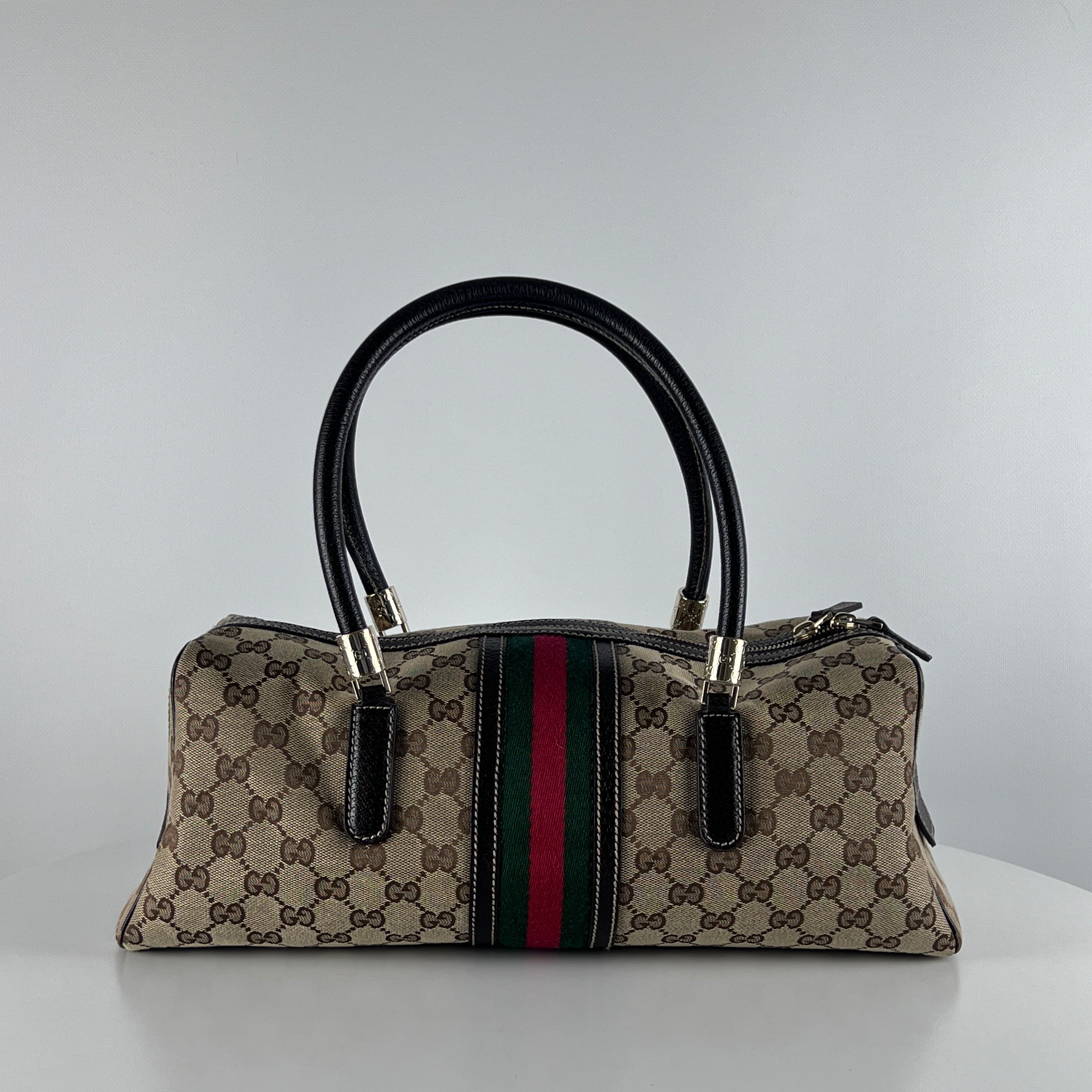 GUCCI Baguette handbag in brown canvas and leather