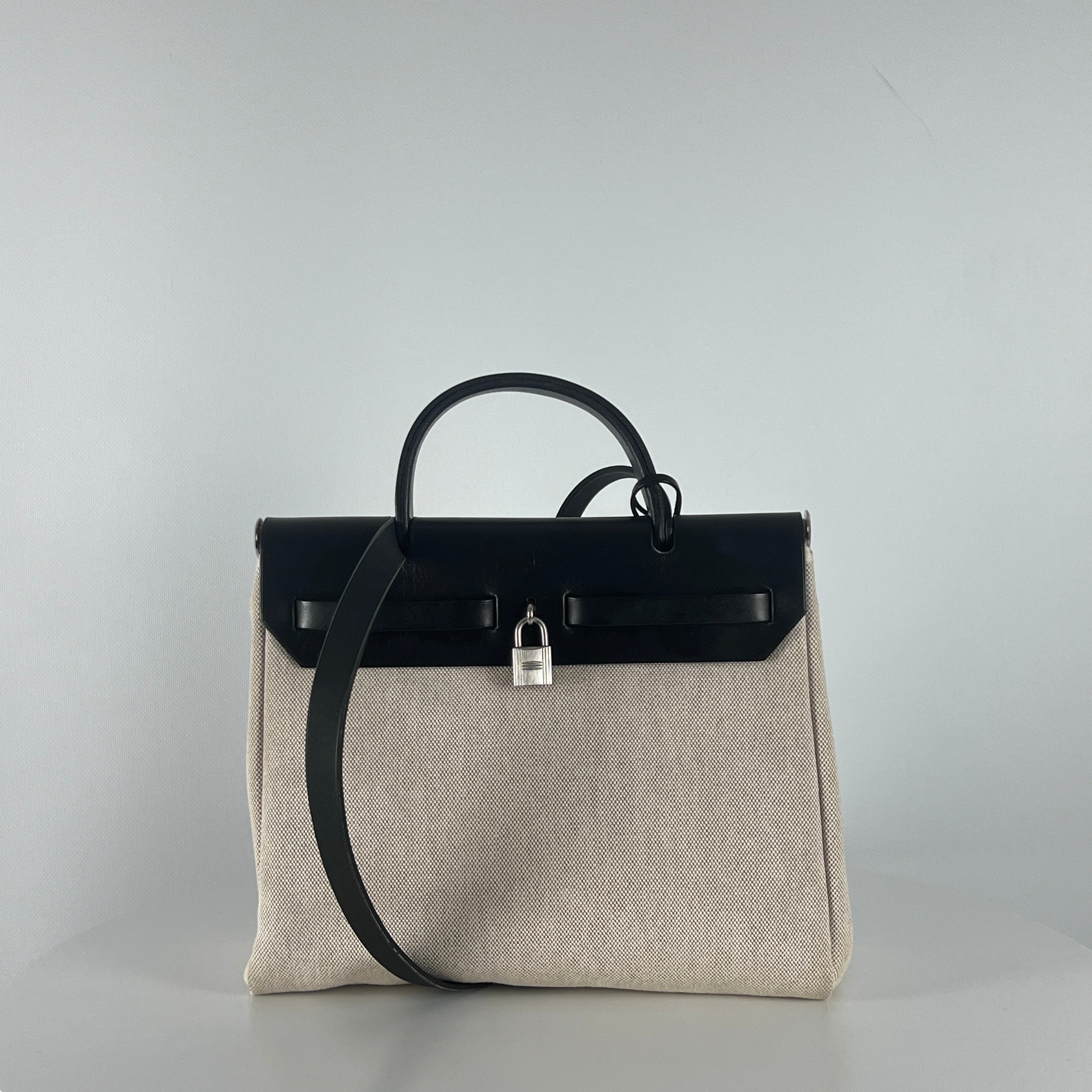 HERMÈS Herbag canvas and black leather handbag