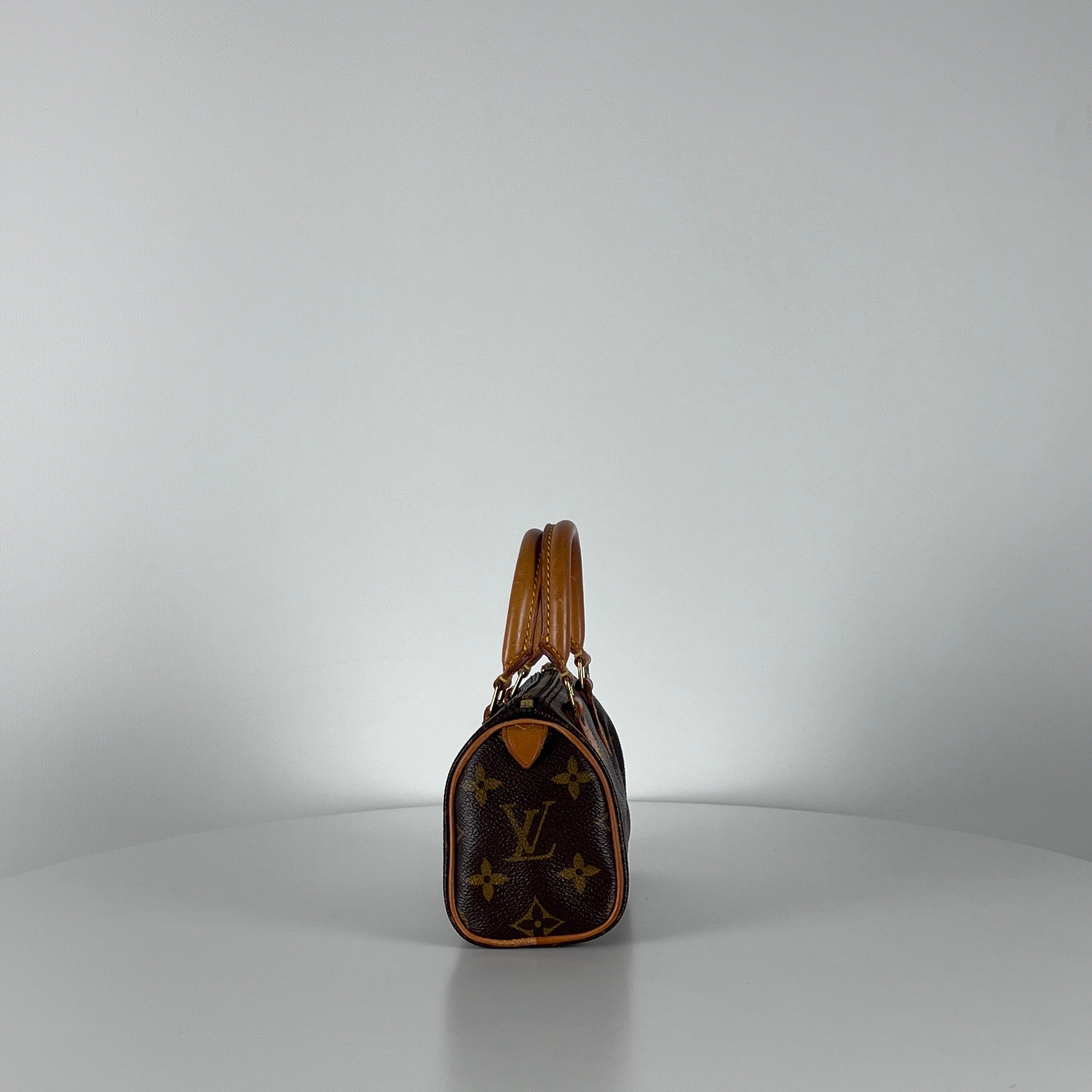 LOUIS VUITTON Nano Speedy handbag in brown canvas and leather