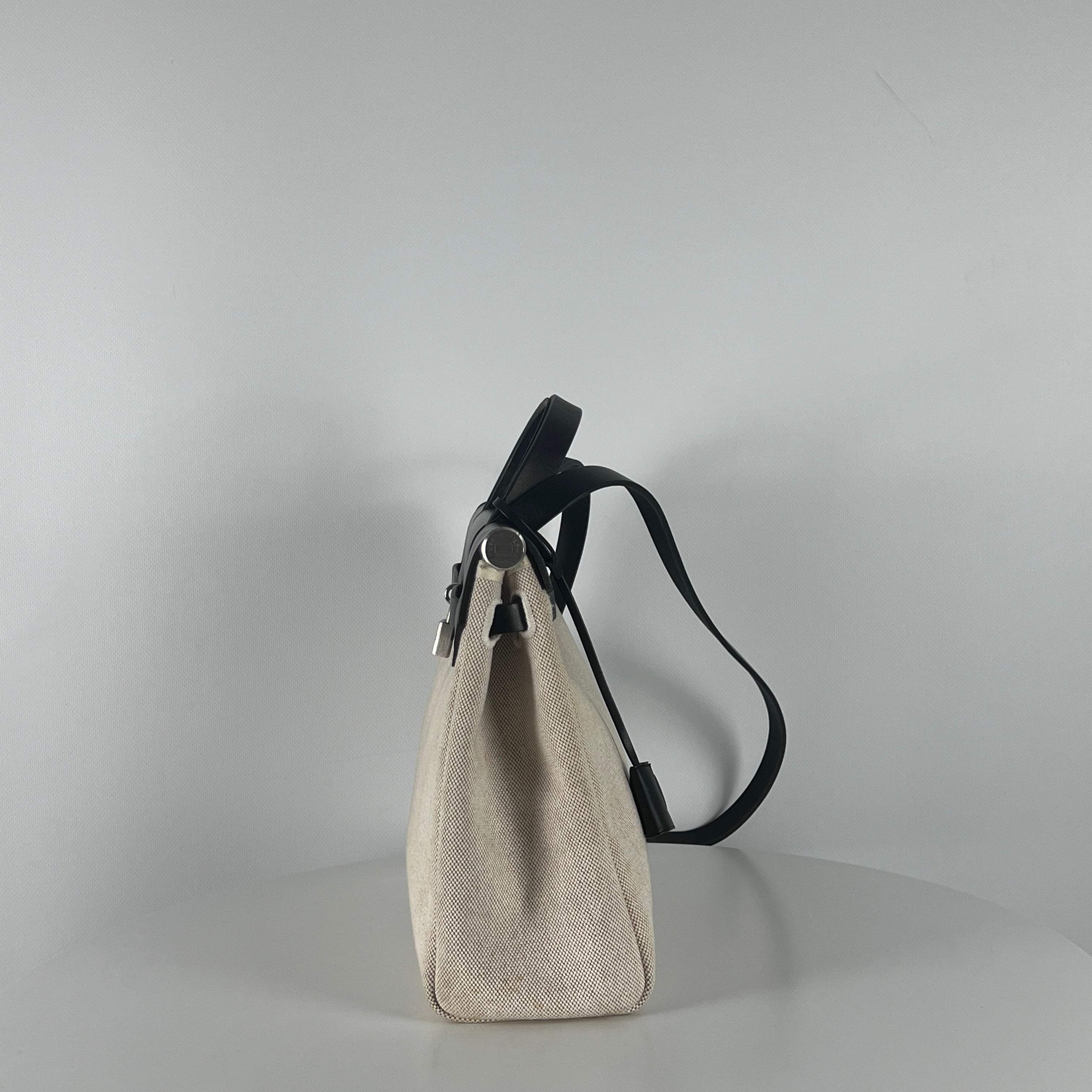 HERMÈS Herbag canvas and black leather handbag
