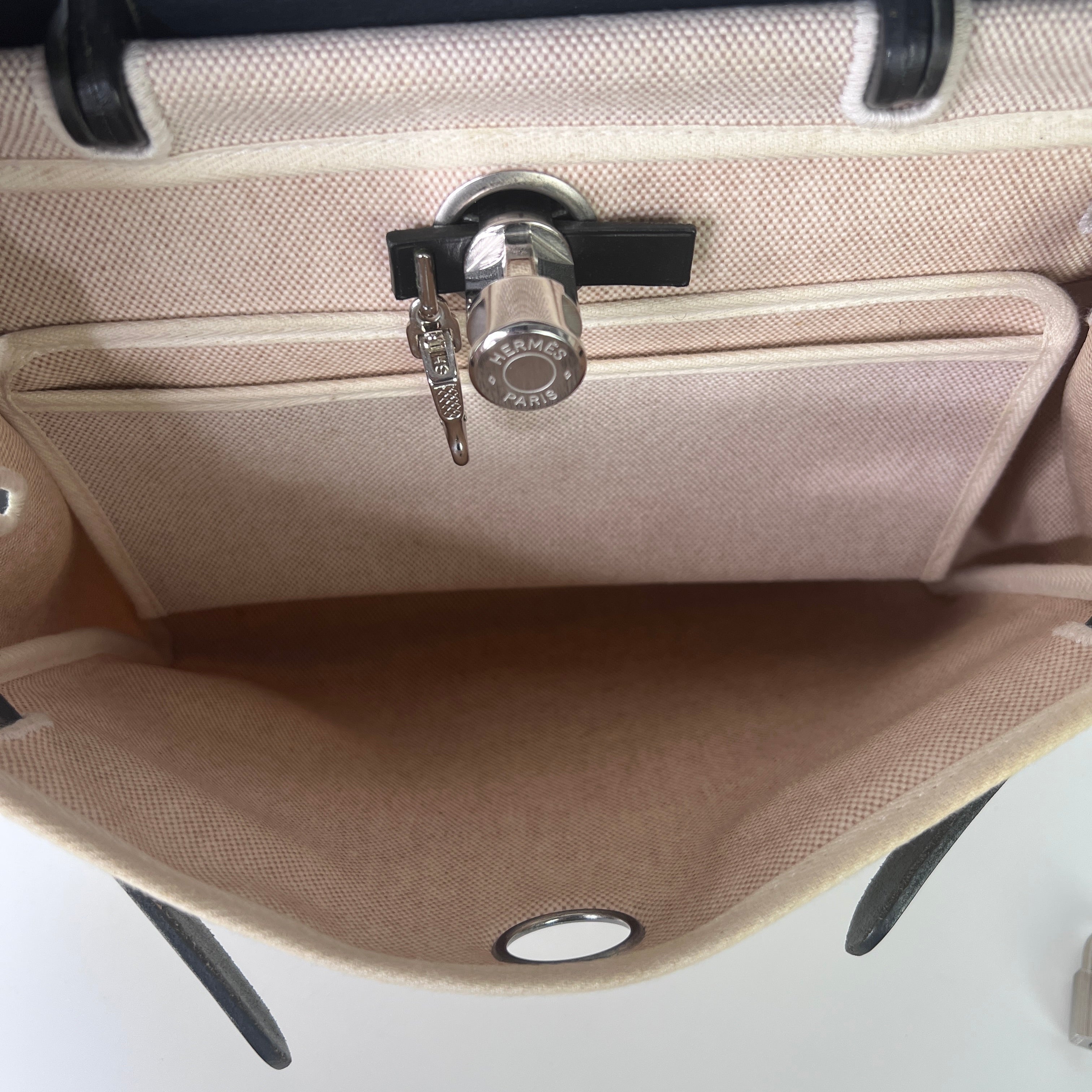 HERMÈS Herbag canvas and black leather handbag