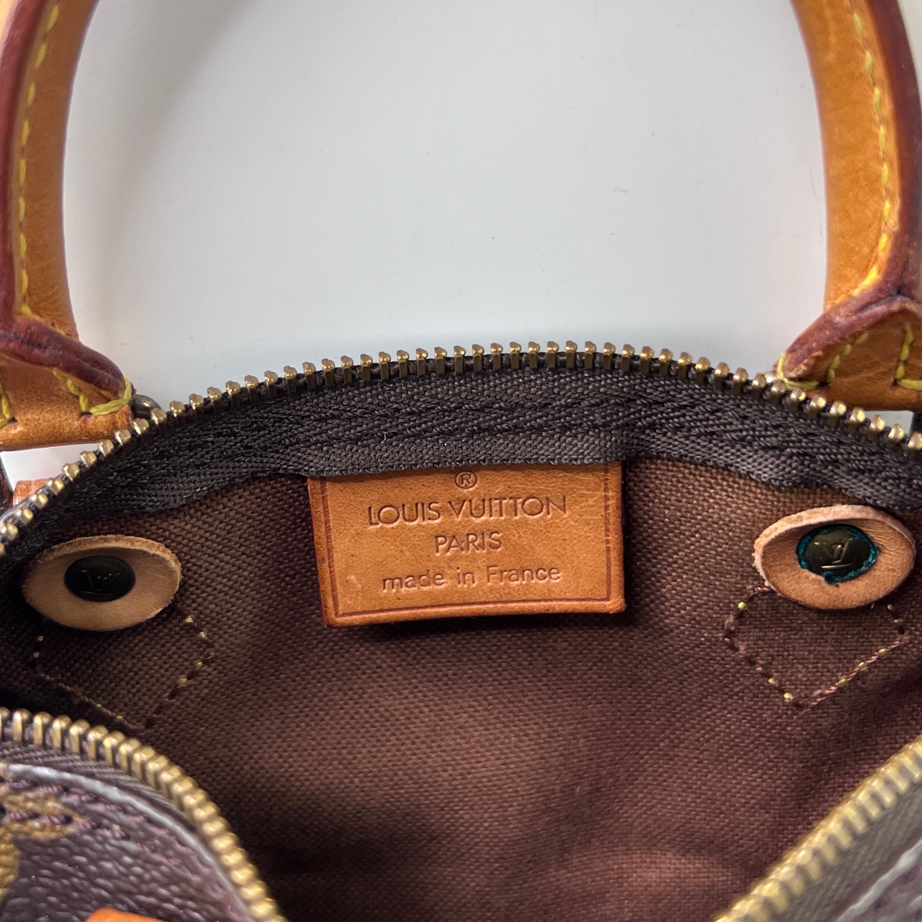 LOUIS VUITTON Nano Speedy handbag in brown canvas and leather