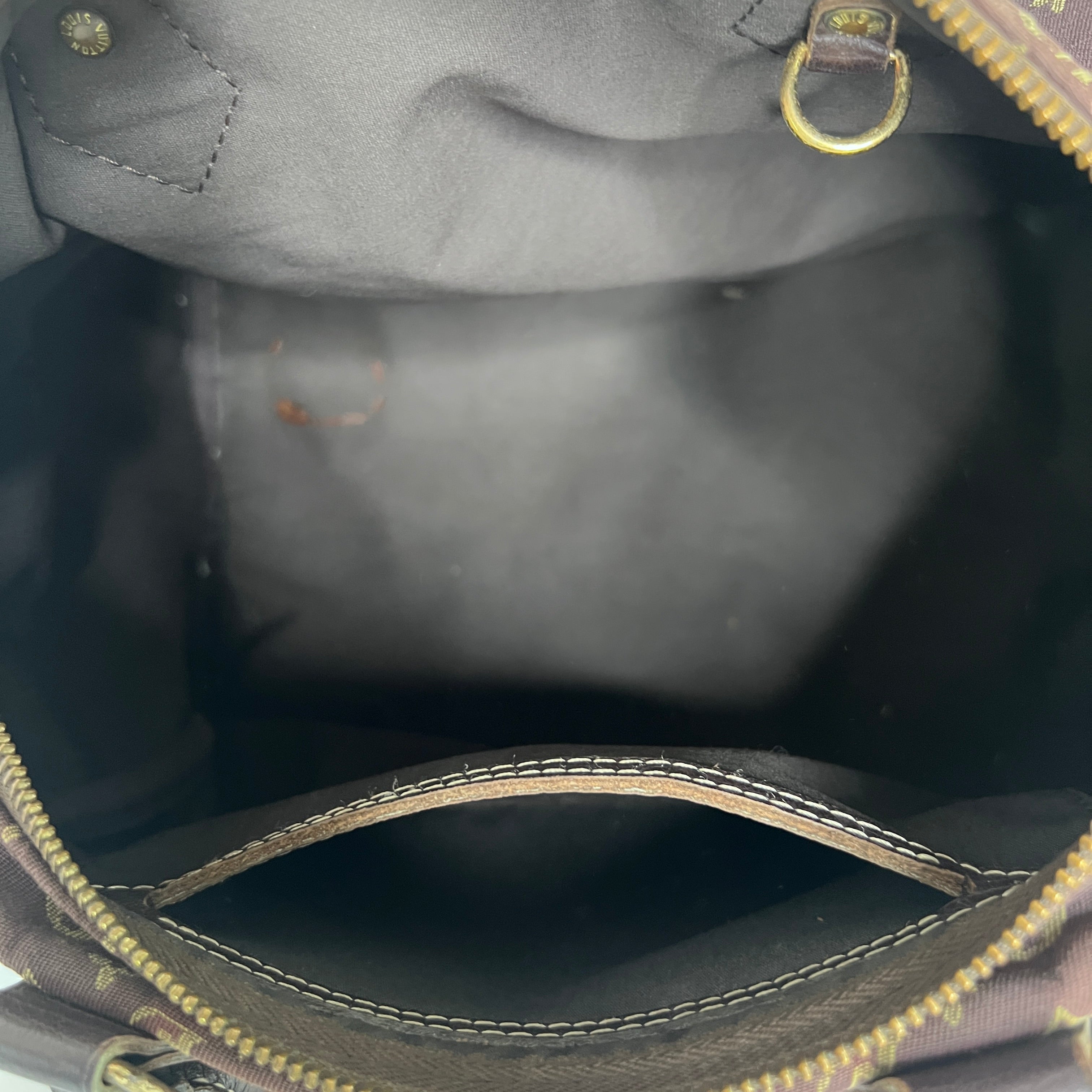 LOUIS VUITTON Speedy linen and brown leather handbag