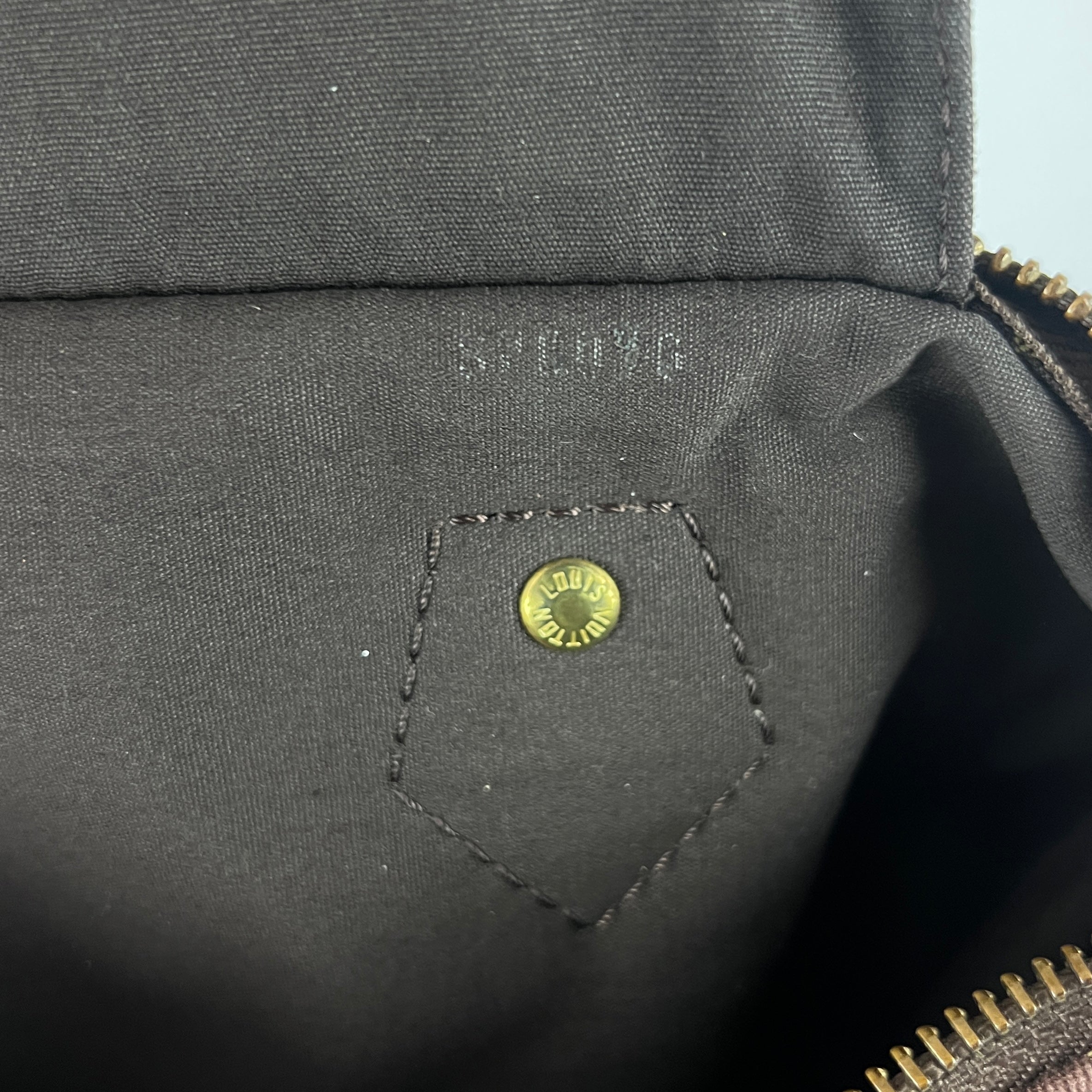 LOUIS VUITTON Speedy linen and brown leather handbag