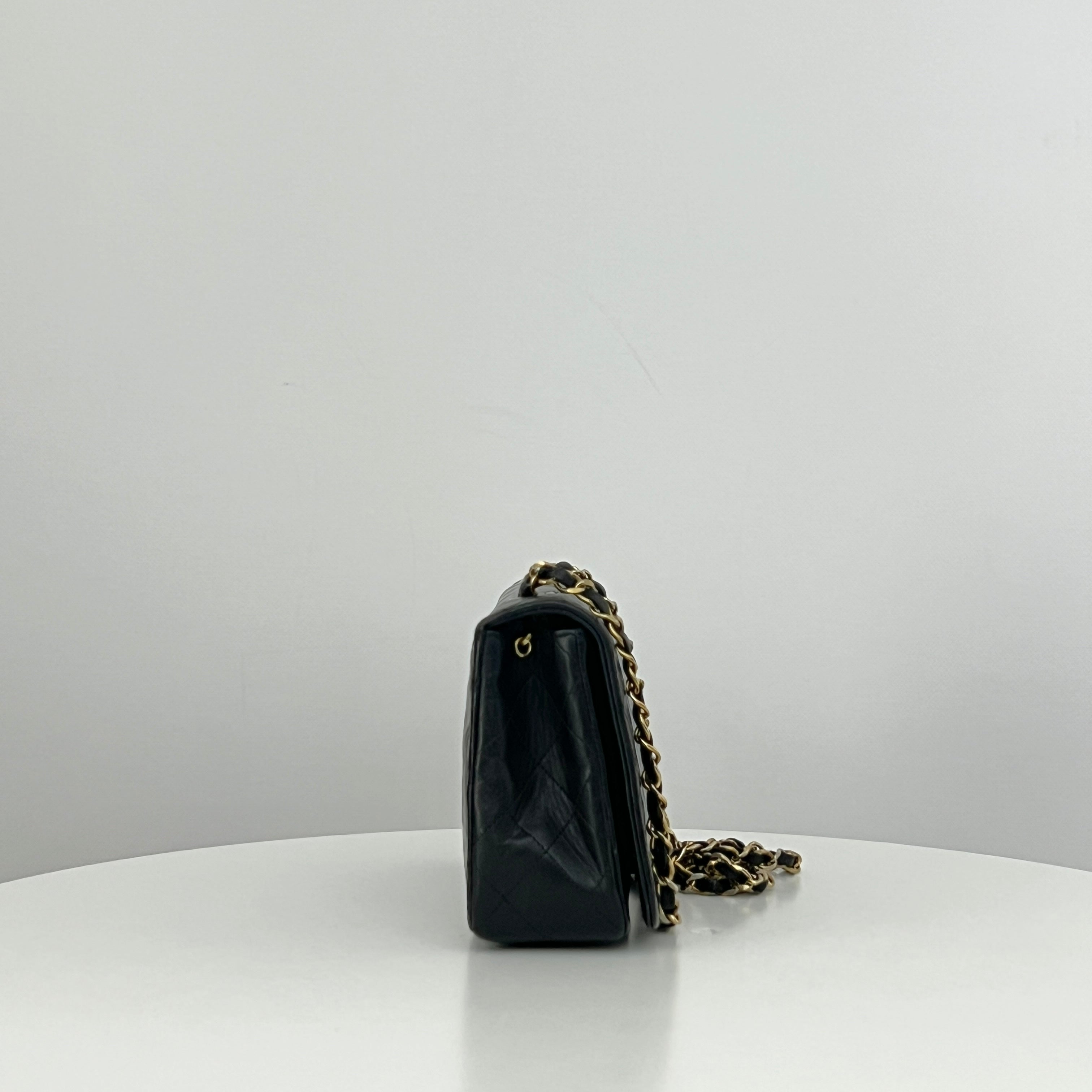 CHANEL Classic Small Shoulder Bag in black lambskin