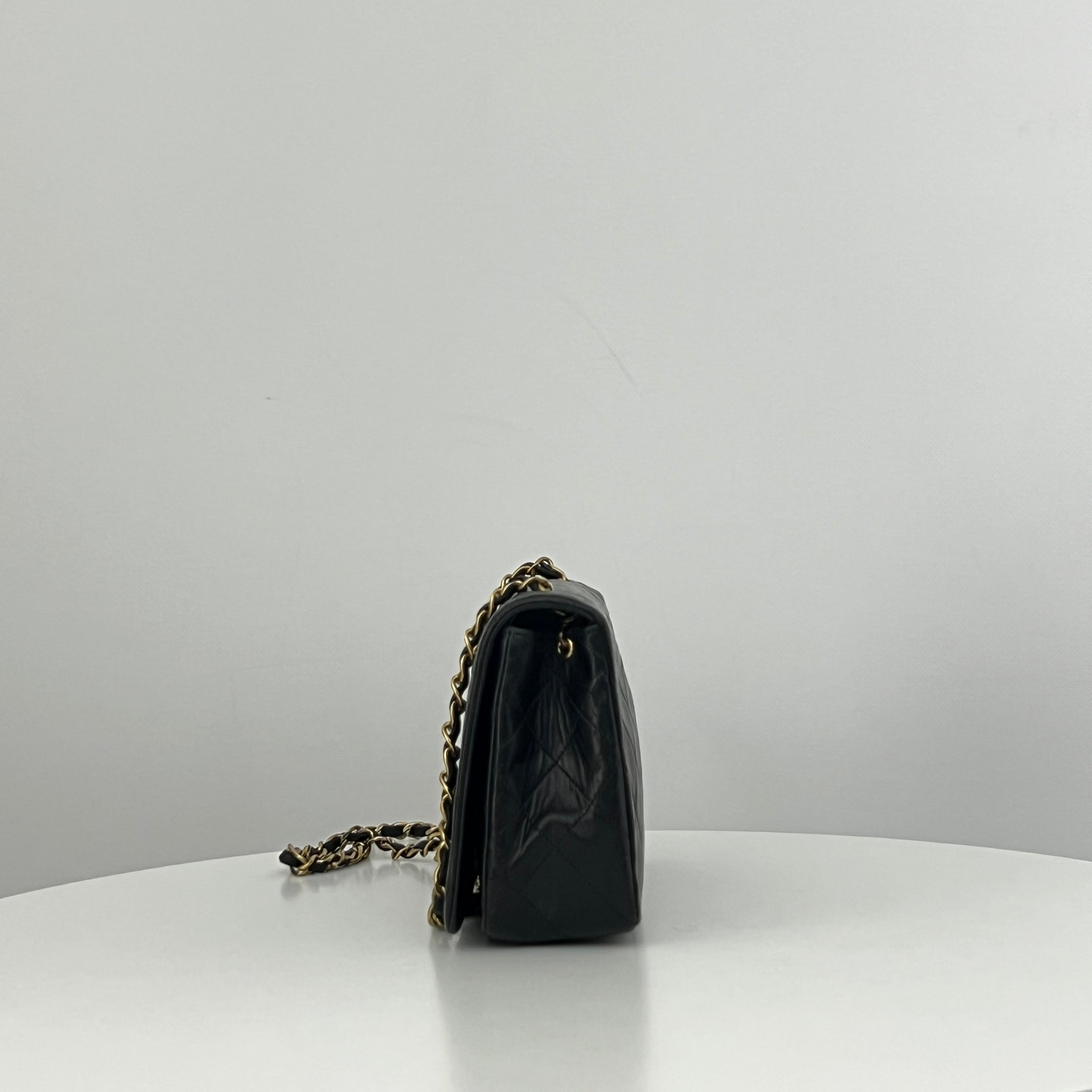 CHANEL Classic Small Shoulder Bag in black lambskin