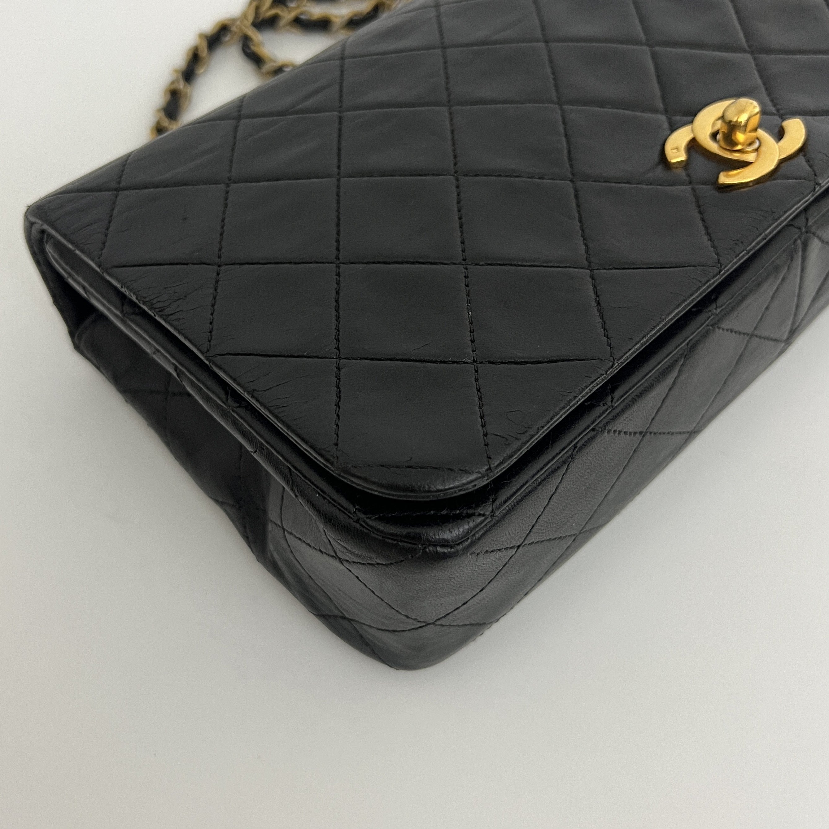 CHANEL Classic Small Shoulder Bag in black lambskin