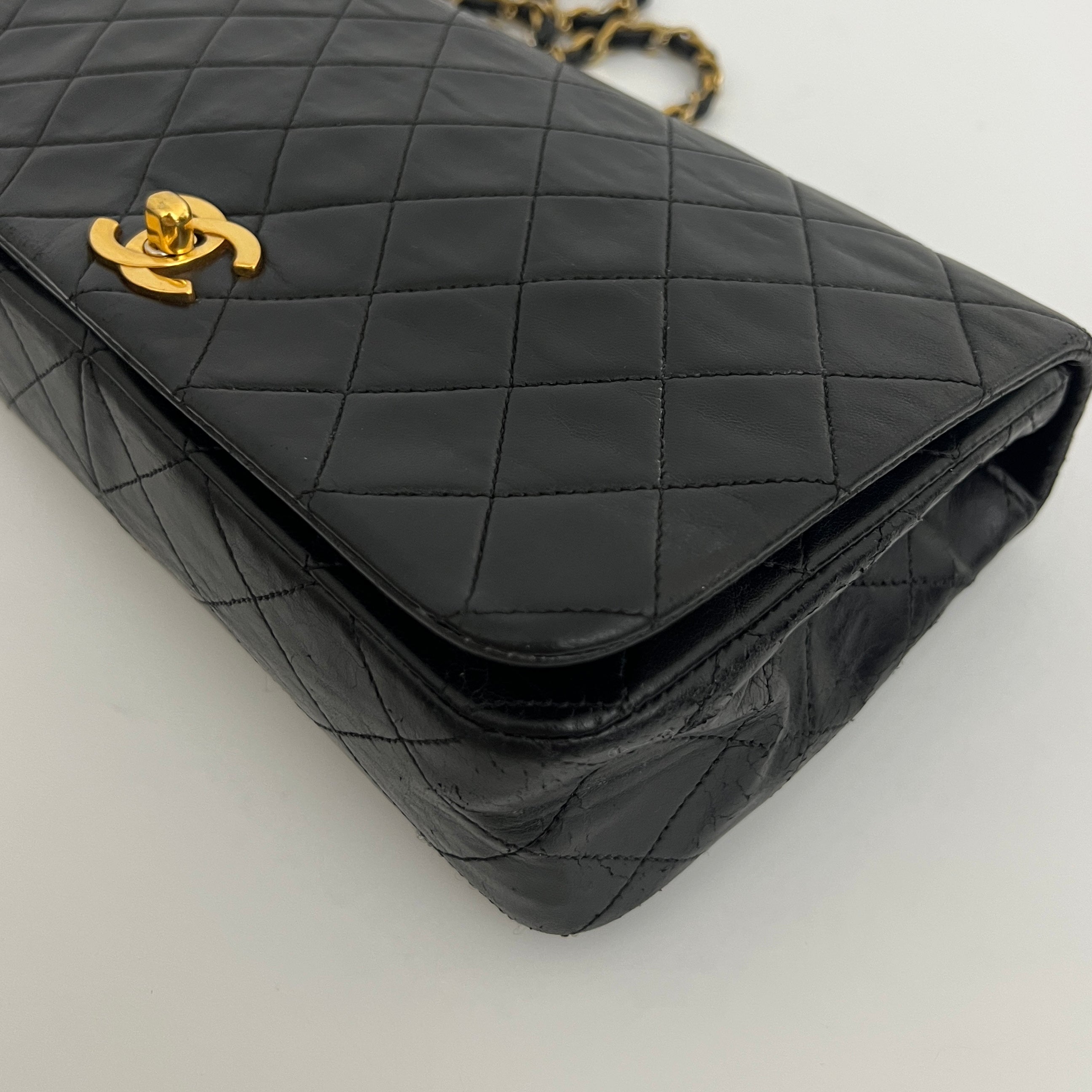 CHANEL Classic Small Shoulder Bag in black lambskin