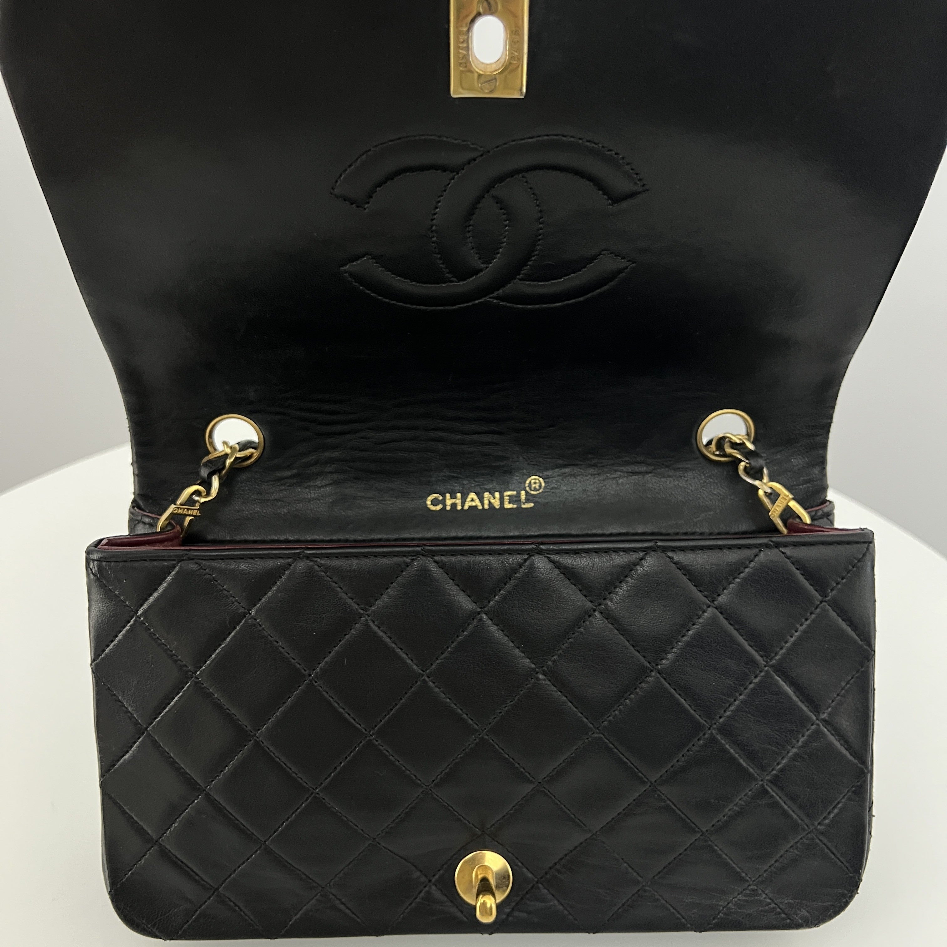 CHANEL Classic Small Shoulder Bag in black lambskin
