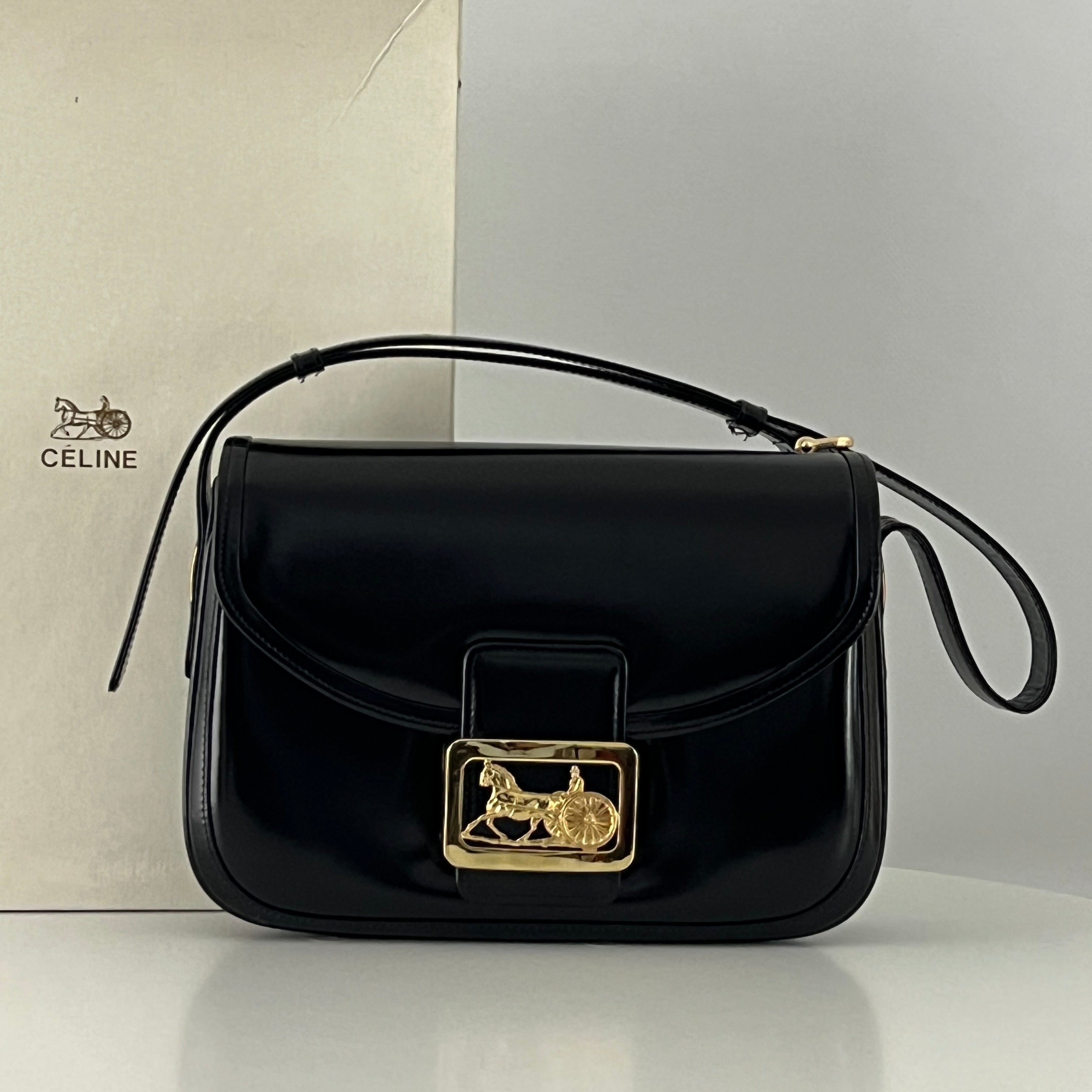 Sac à main CELINE Triomphe cuir noir