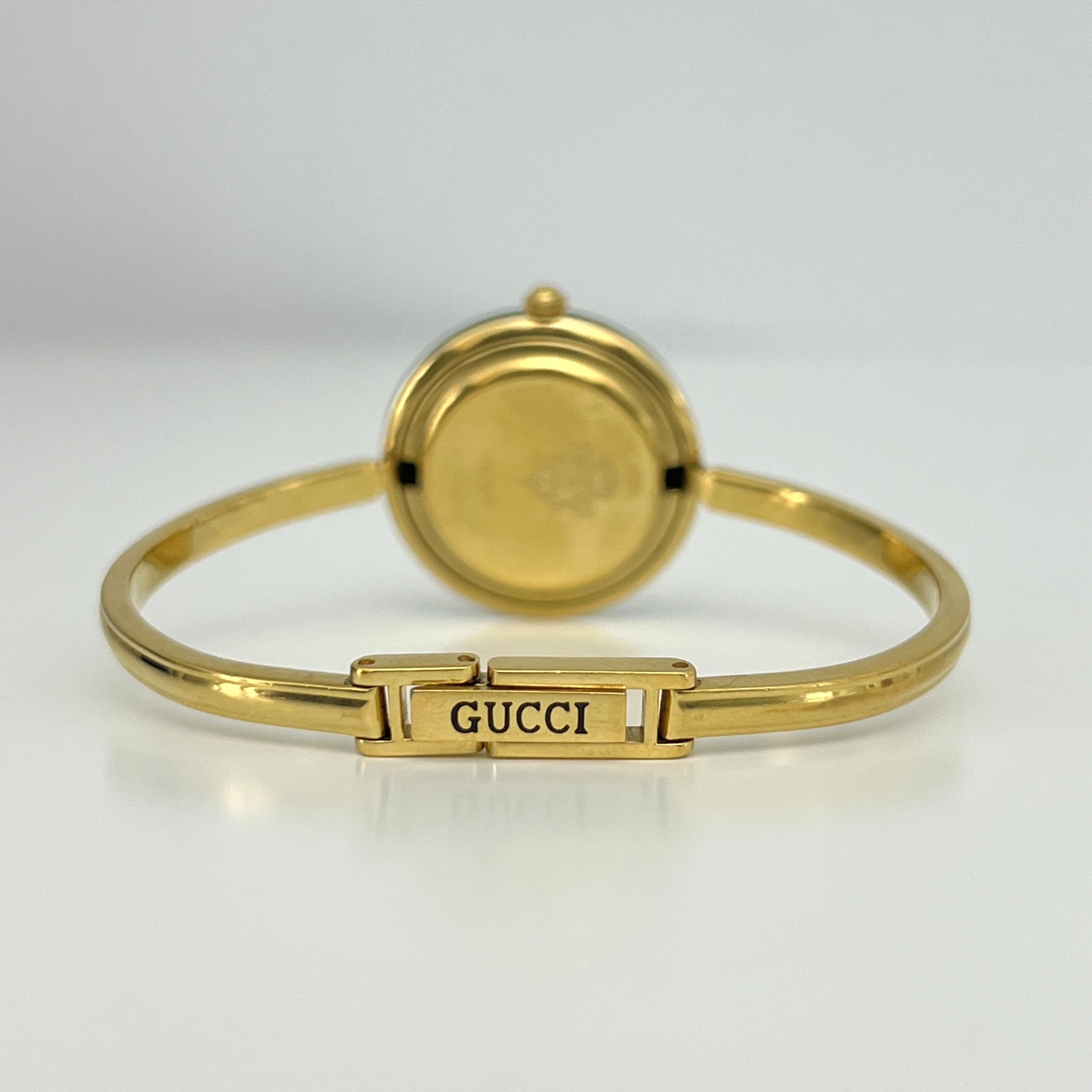 Montre GUCCI Play plaqué or doré