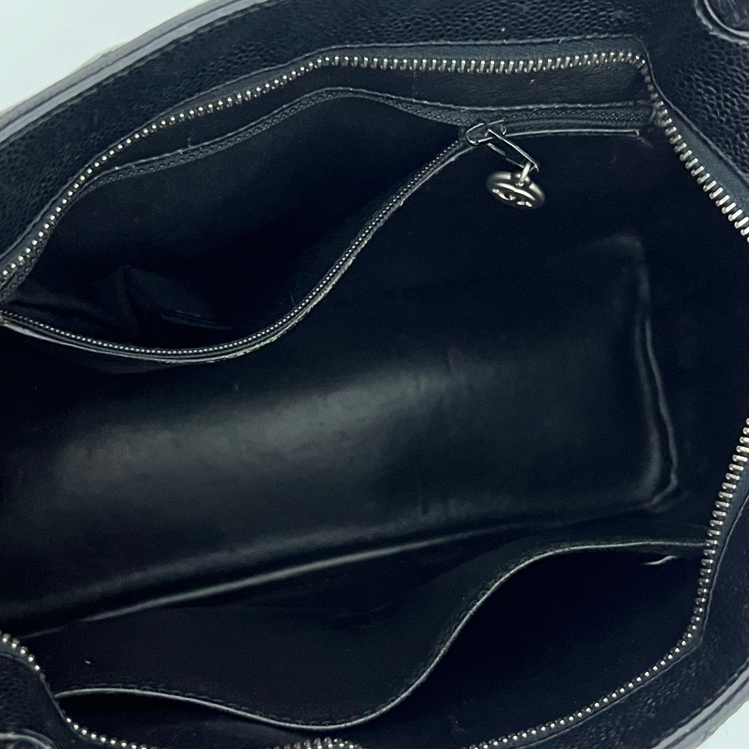 CHANEL Medallion bag in black caviar leather