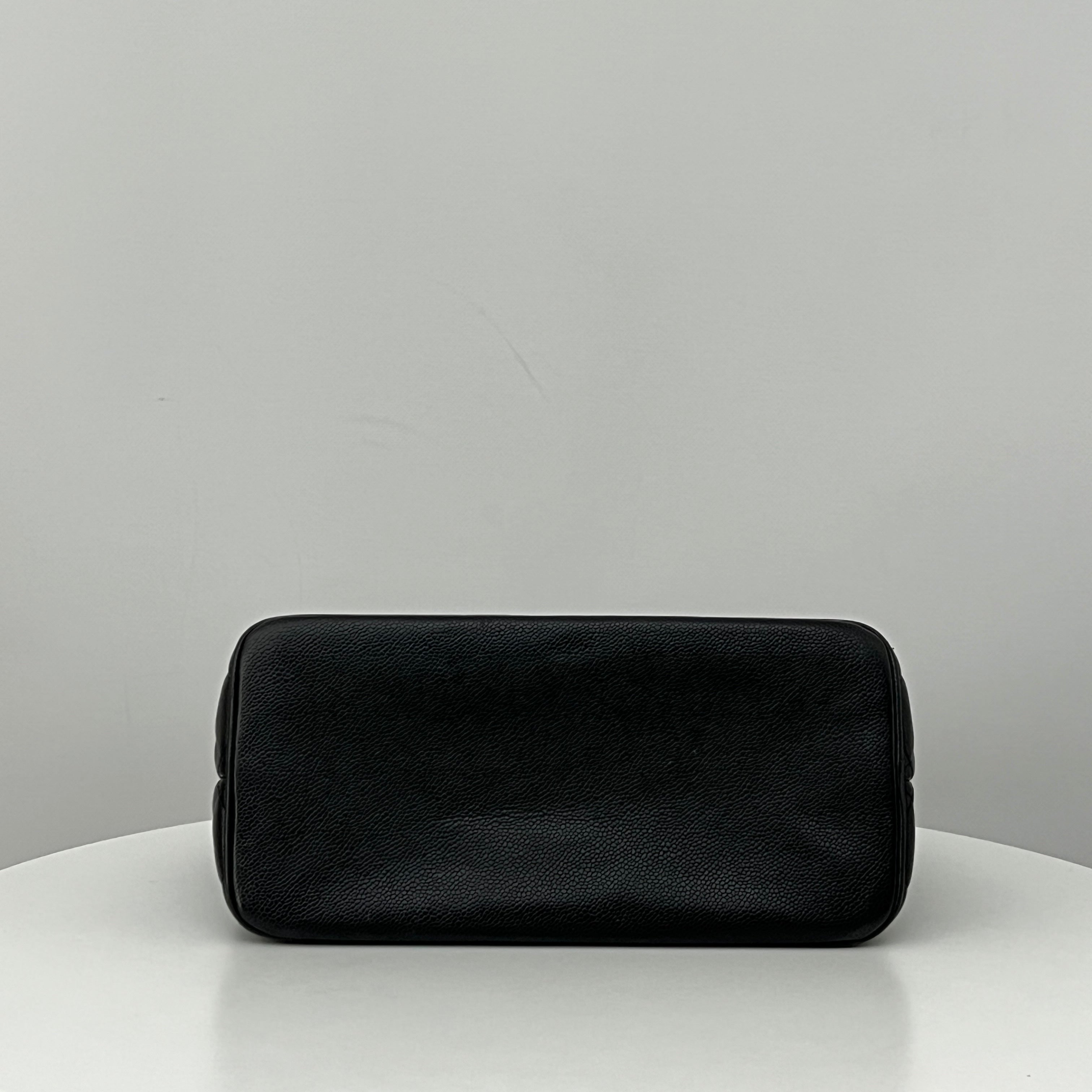 CHANEL Medallion bag in black caviar leather