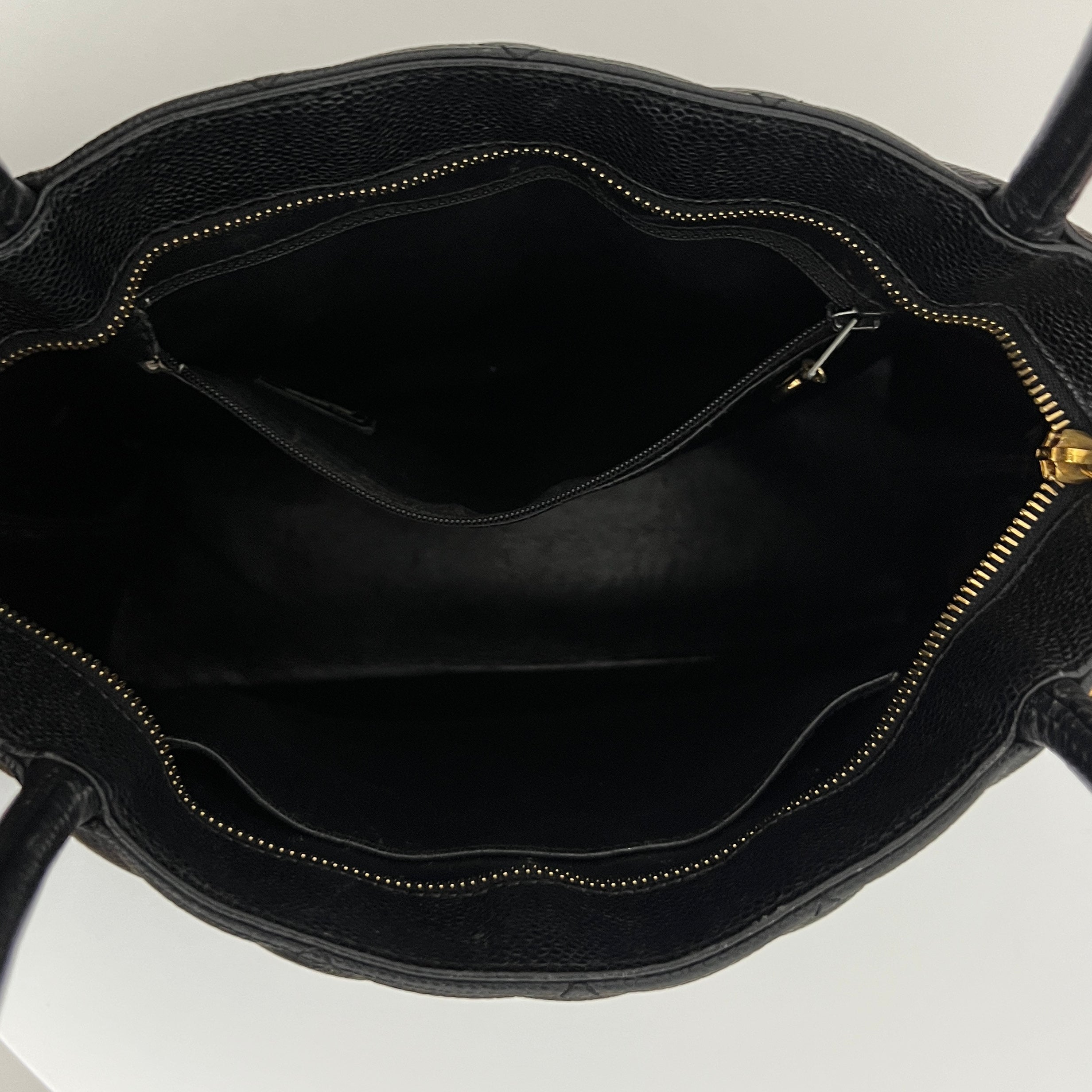 CHANEL Medallion bag in black caviar leather