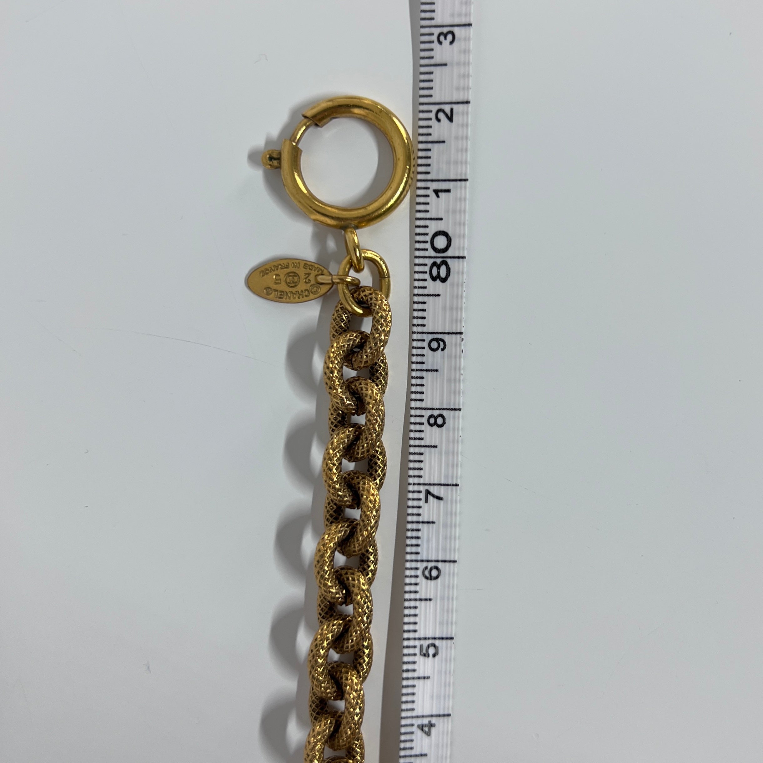 Collier CHANEL Coco Mark Croix plaqué or doré