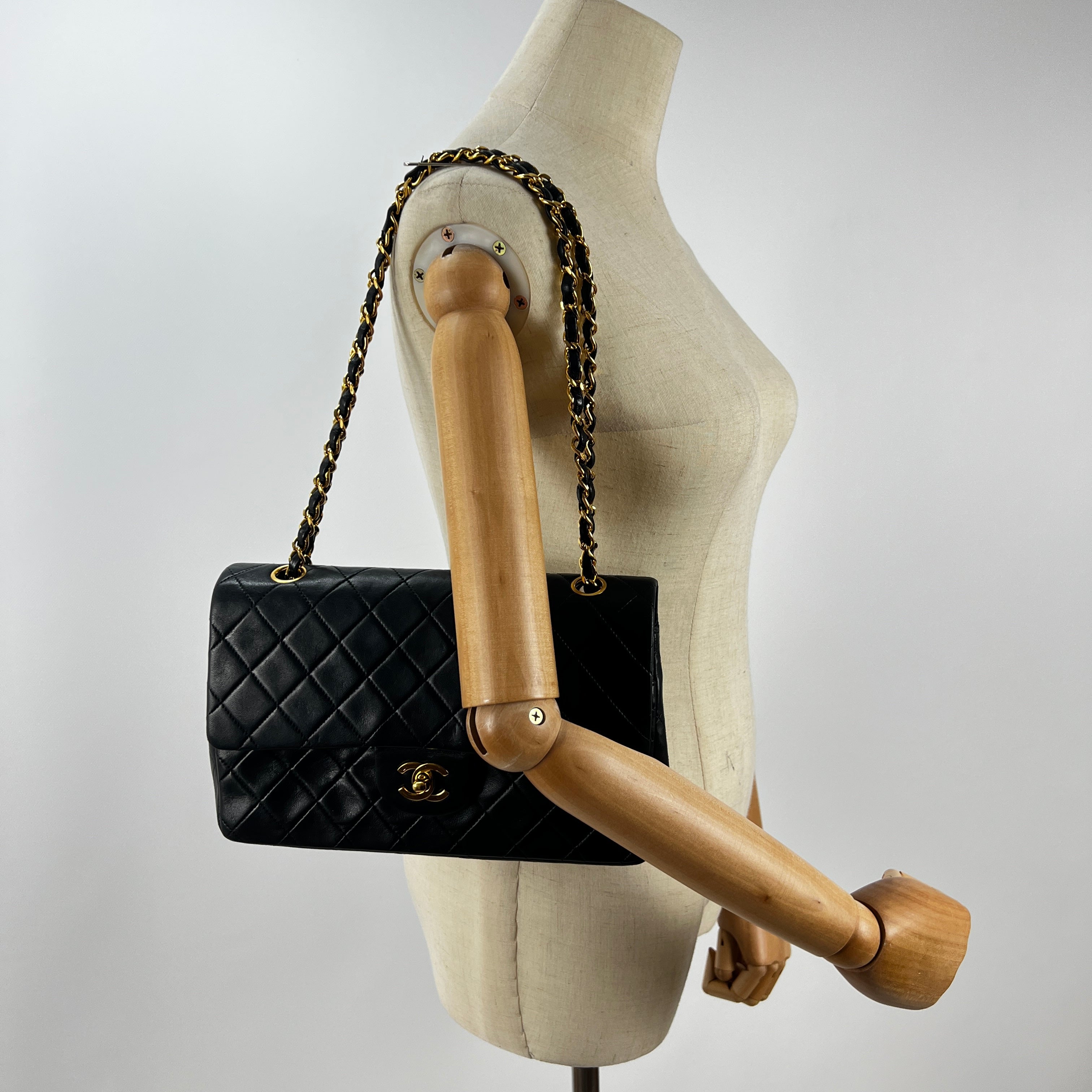 CHANEL Timeless classic medium double flap black leather handbag