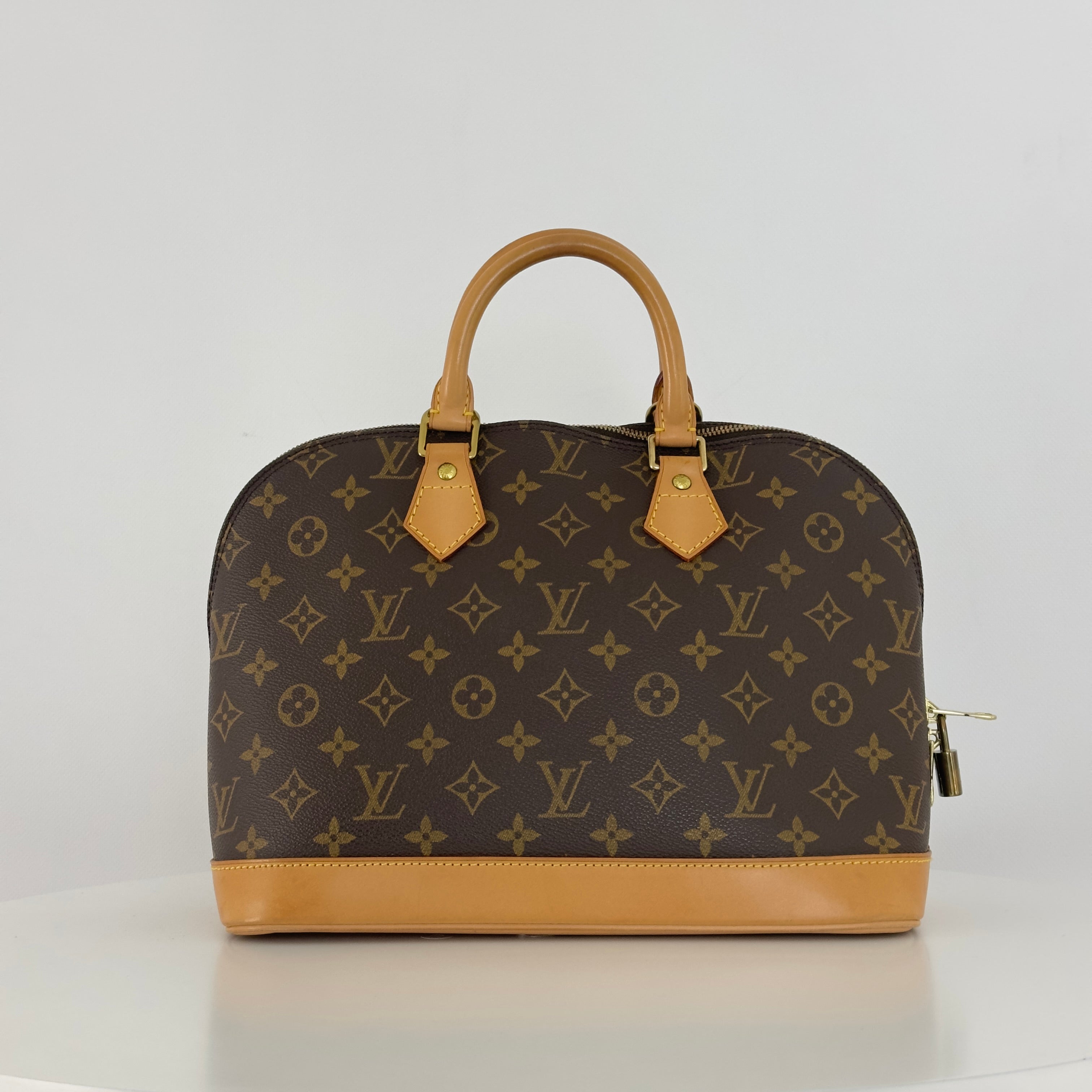 LOUIS VUITTON Alma MM handbag in brown canvas and leather