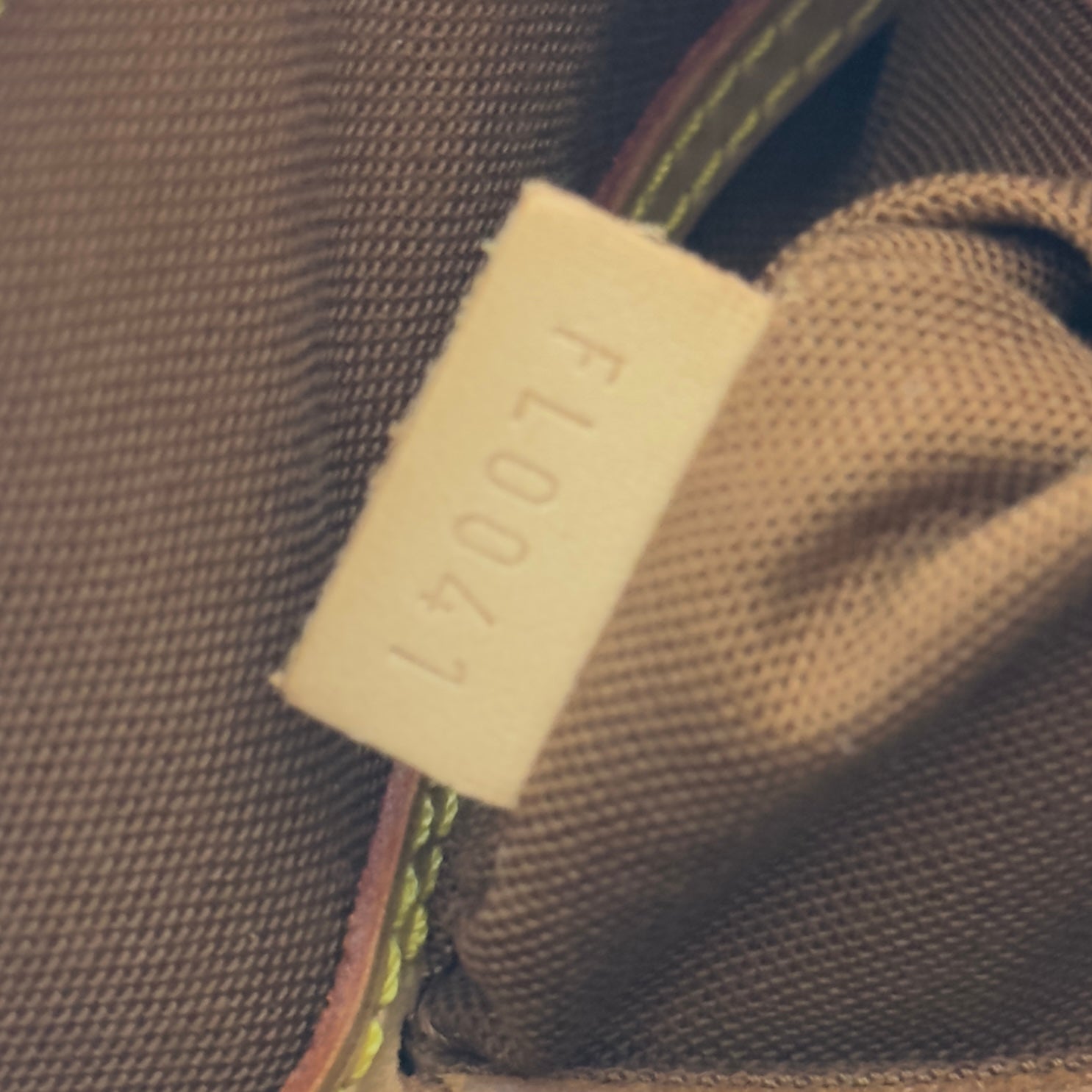 LOUIS VUITTON Alma MM handbag in brown canvas and leather