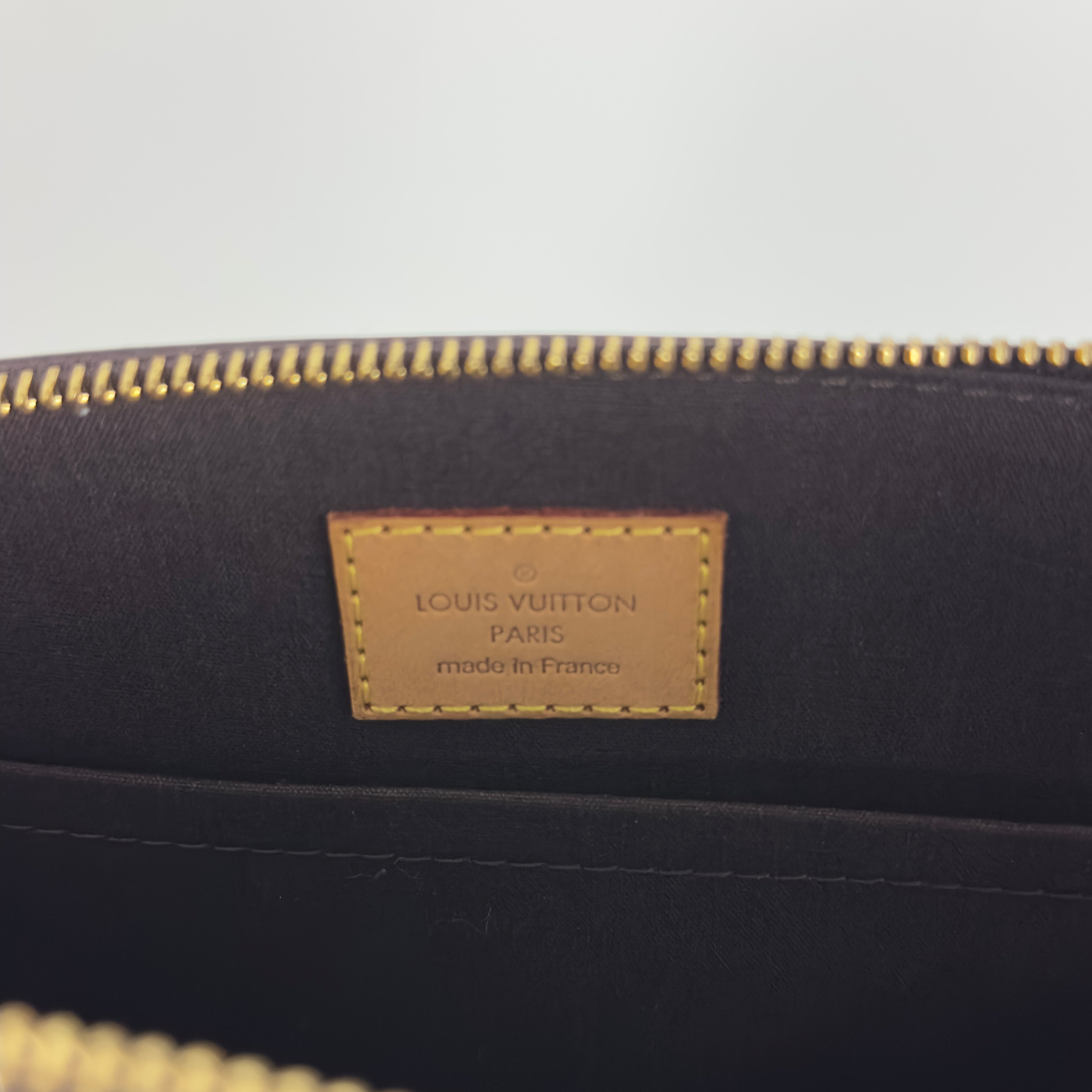 Sac à main LOUIS VUITTON Sherwood cuir verni violet