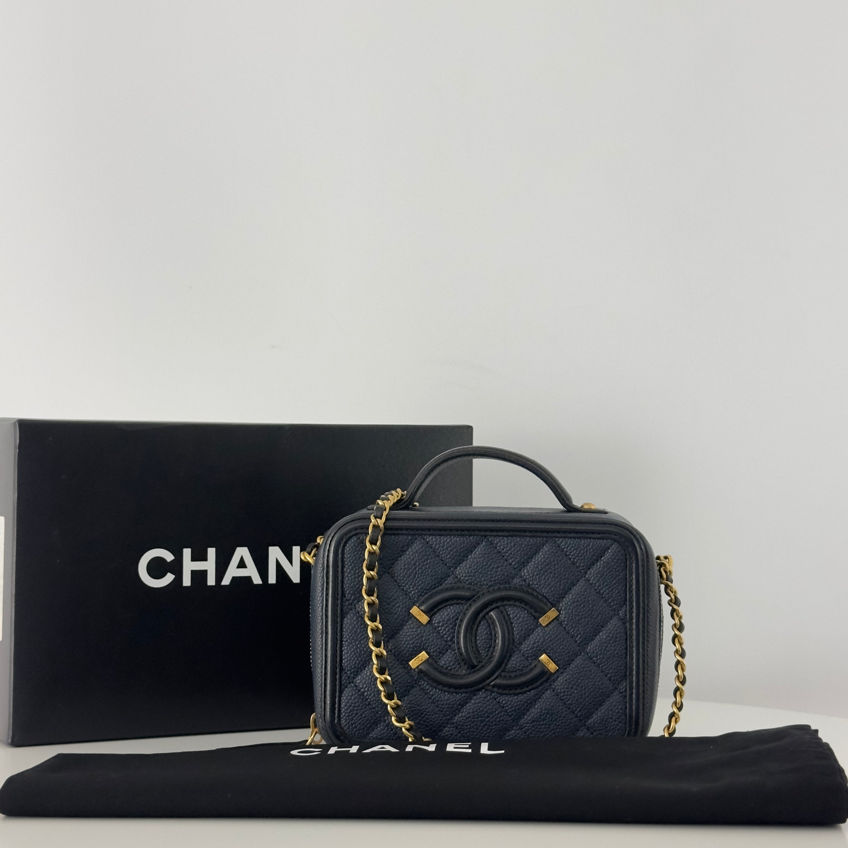 CHANEL Filigree Vanity Case handbag in midnight blue caviar leather