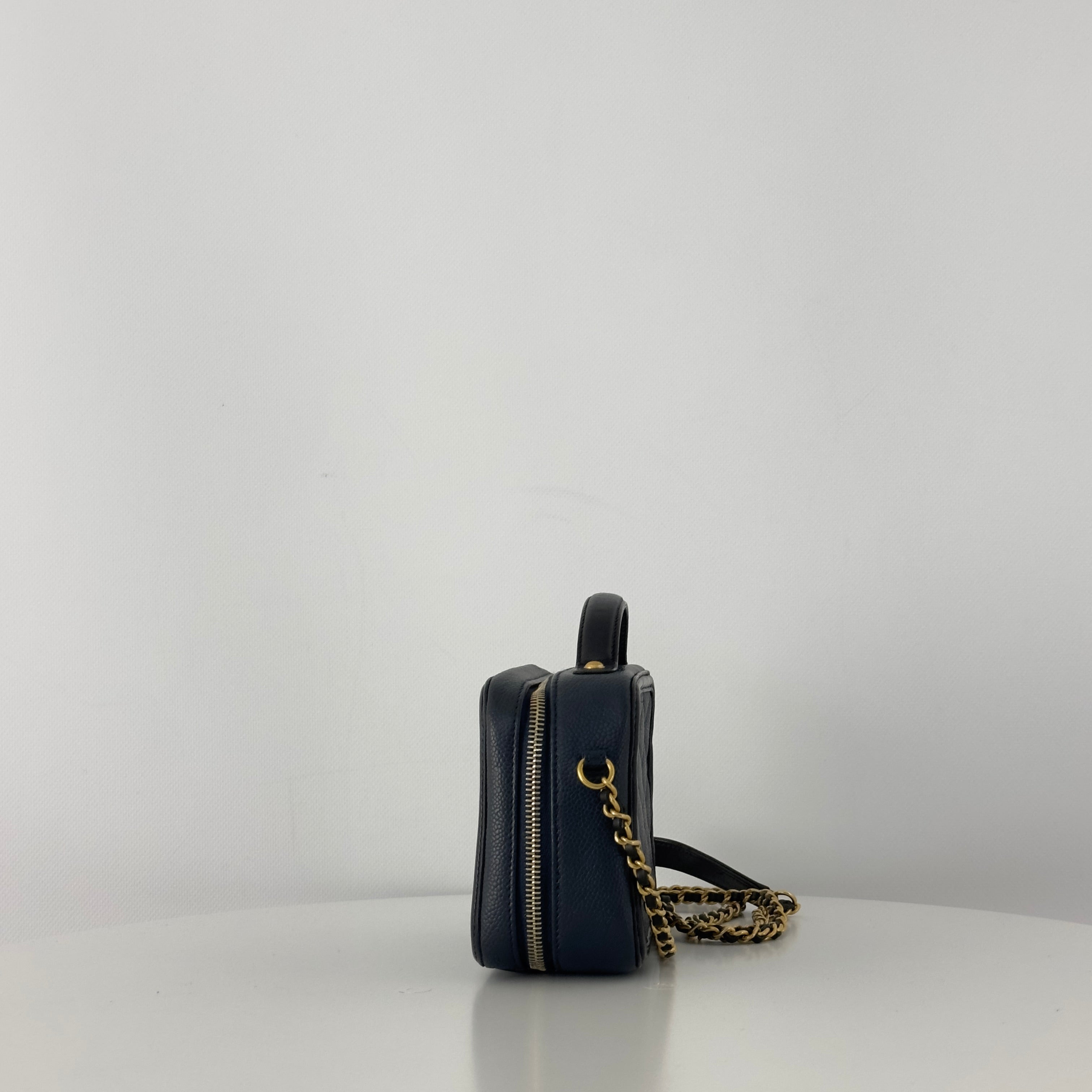 CHANEL Filigree Vanity Case handbag in midnight blue caviar leather