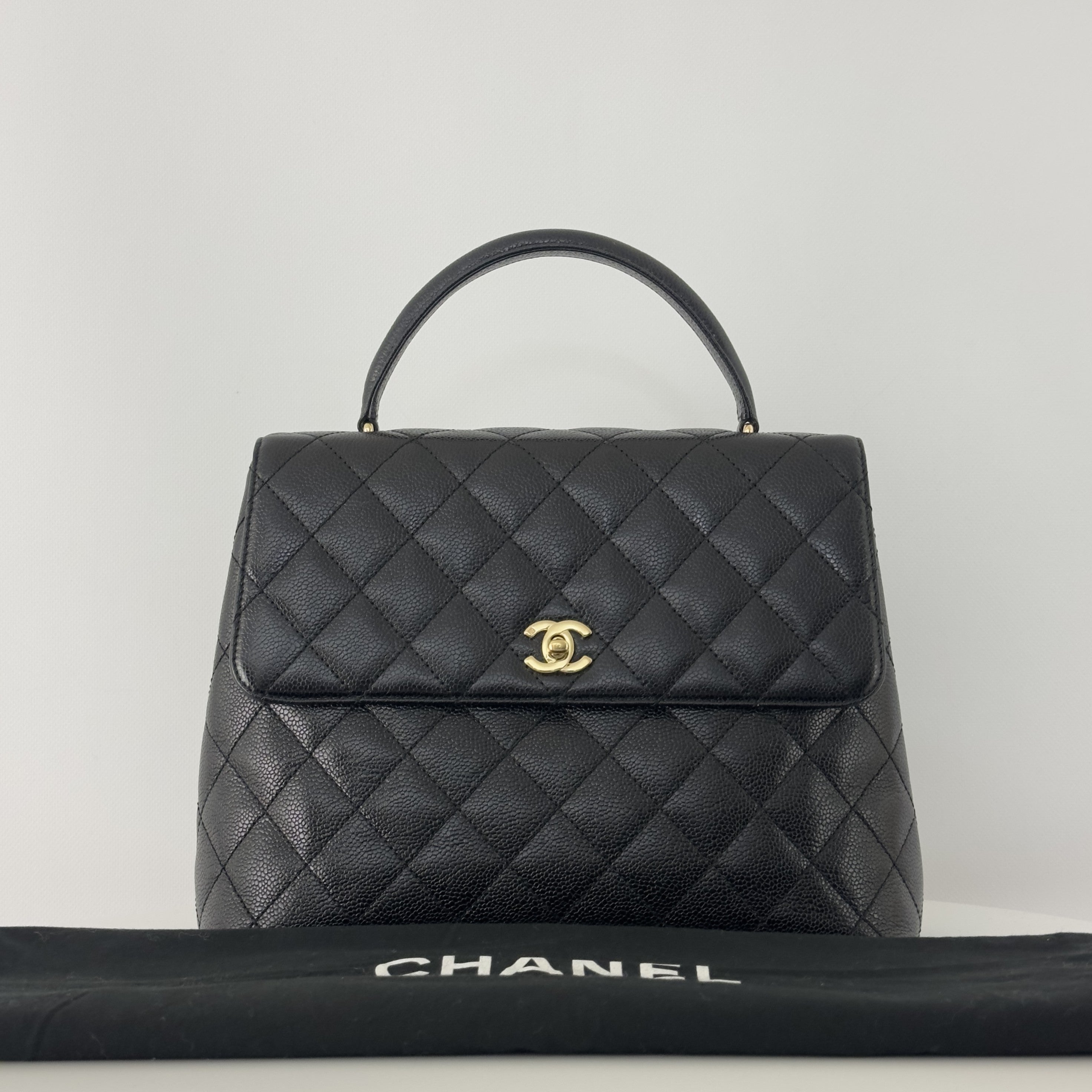 Sac à main CHANEL Top Handle cuir caviar noir
