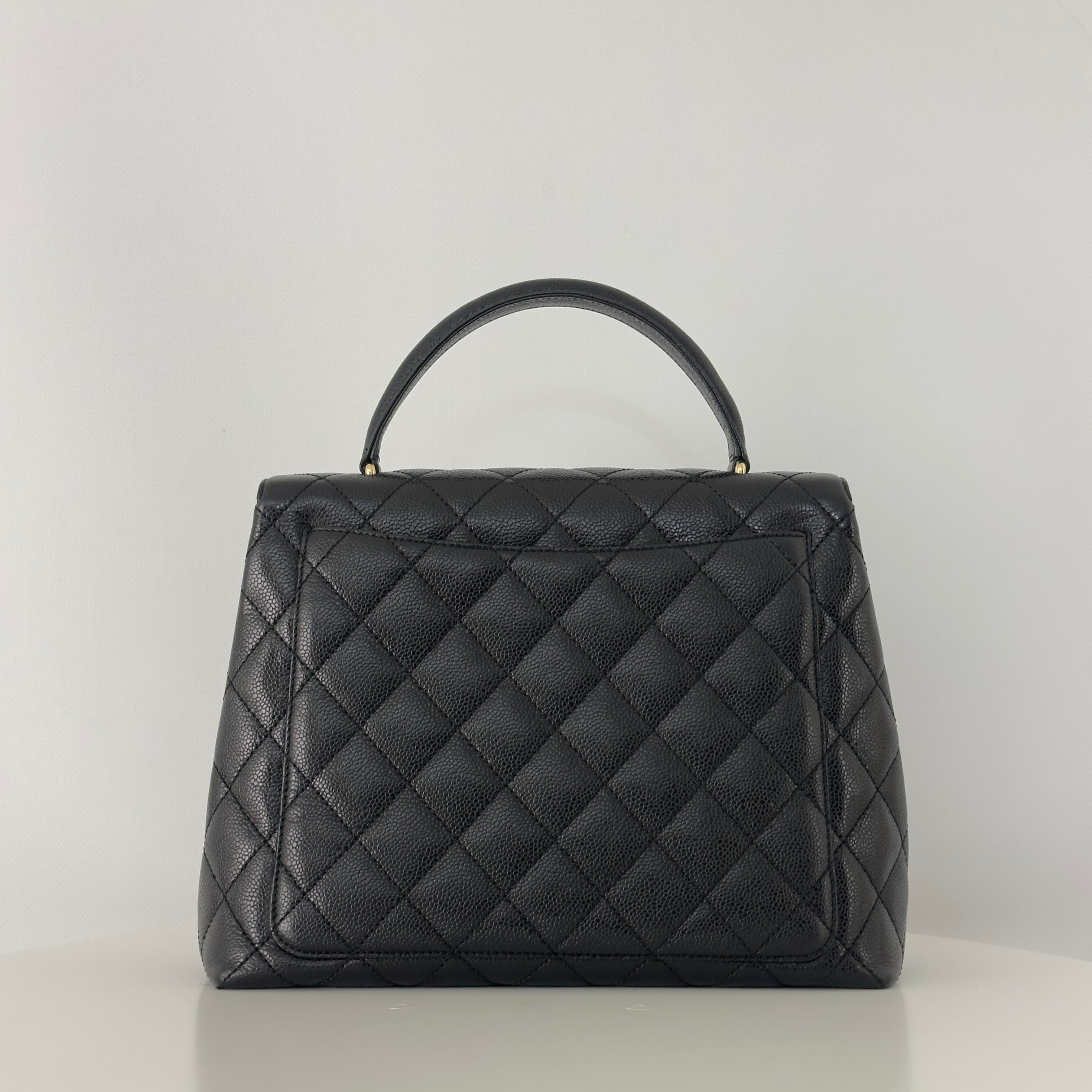 Sac à main CHANEL Top Handle cuir caviar noir